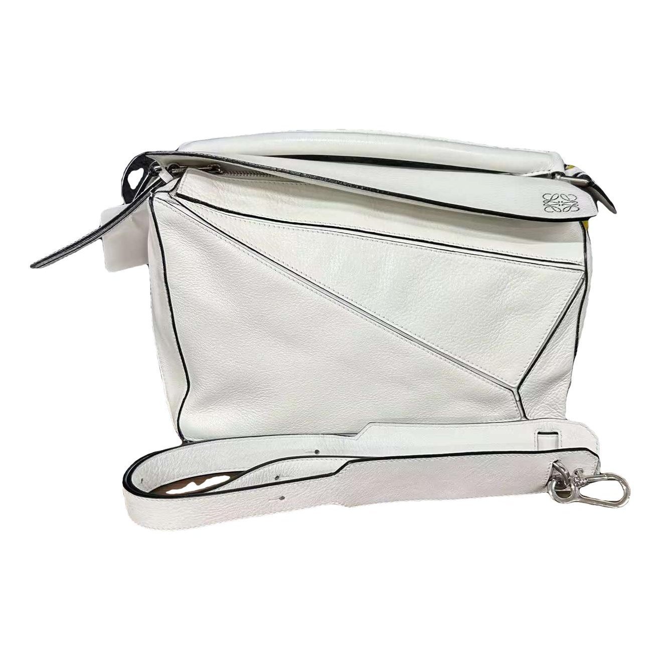 Puzzle leather handbag