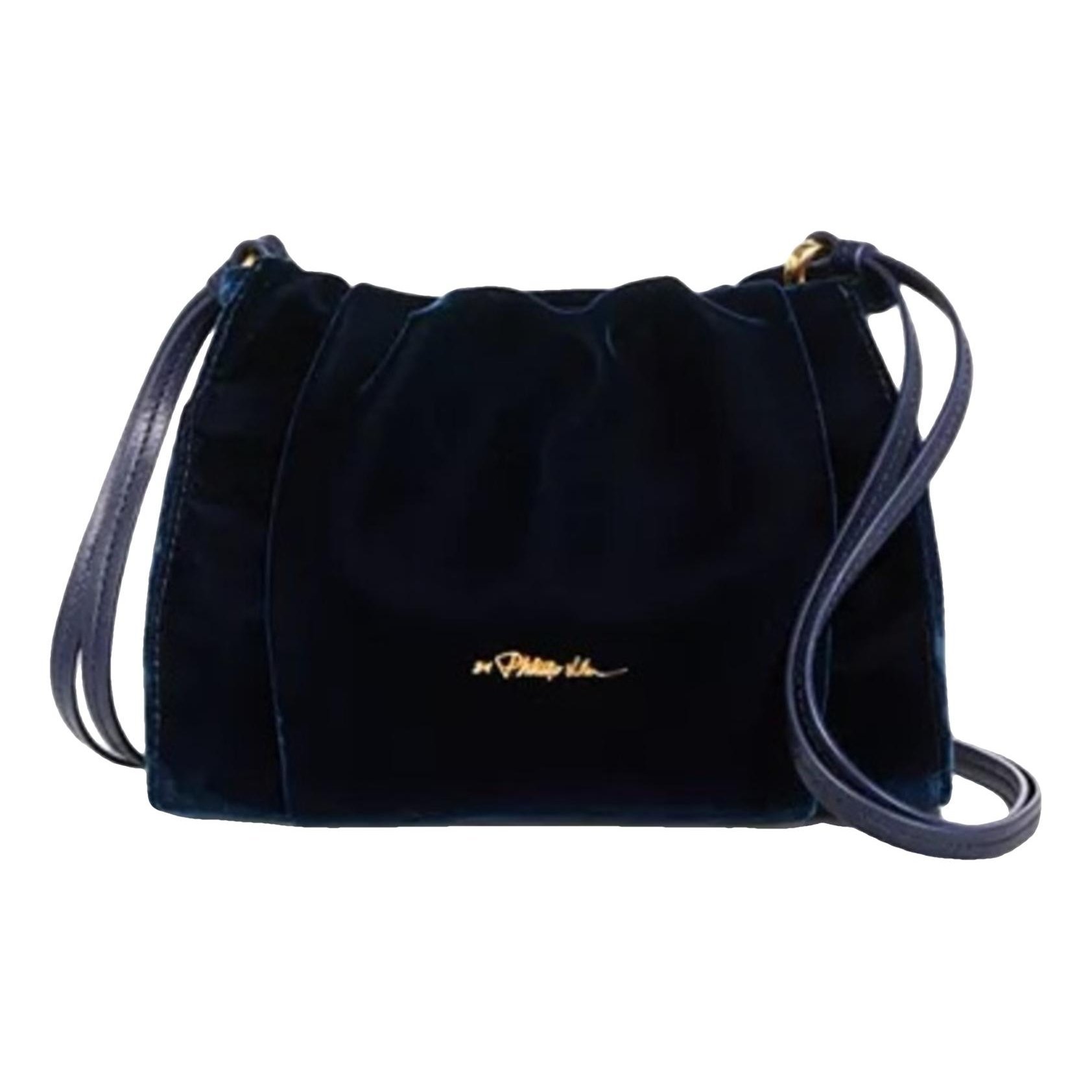 Velvet handbag