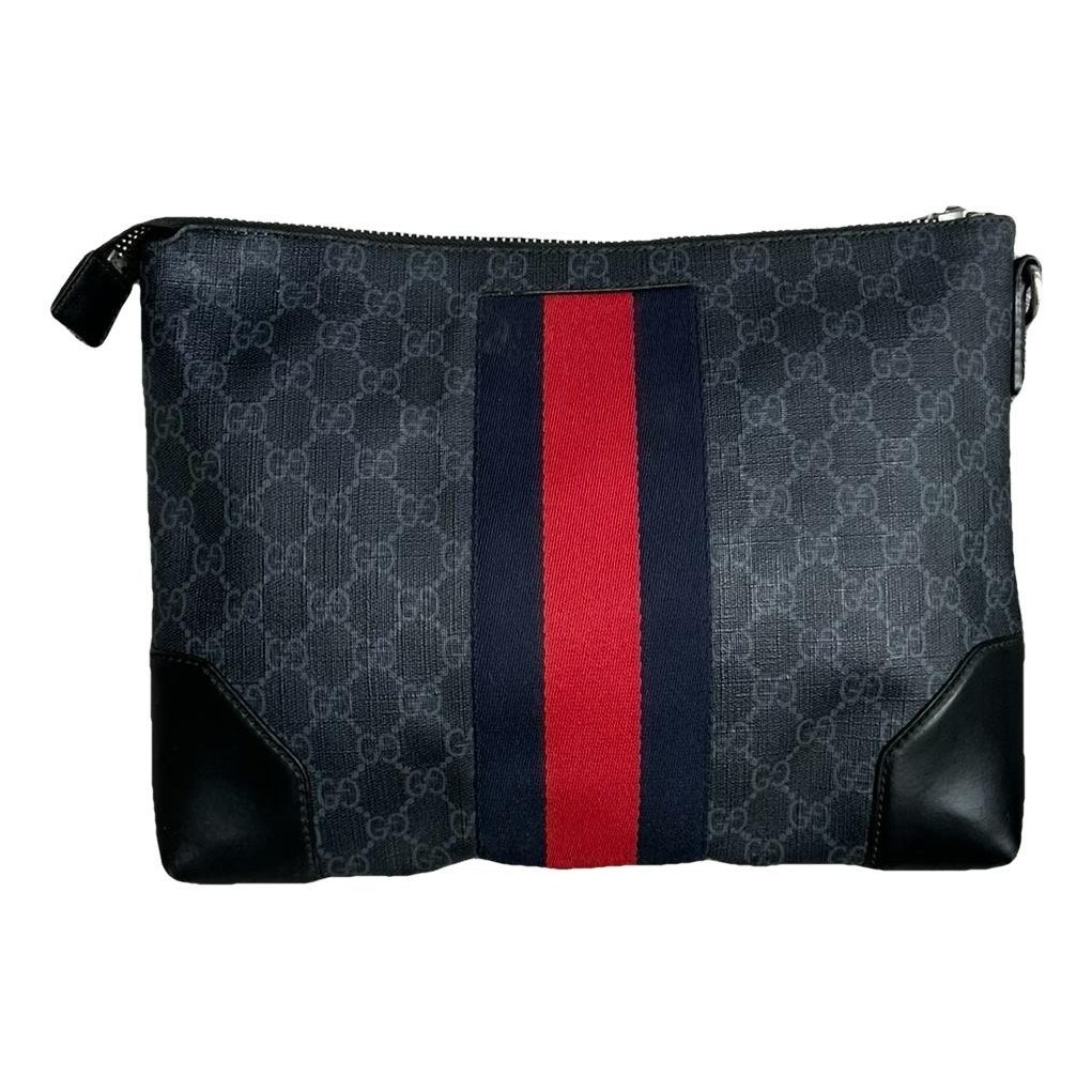 Ophidia cloth clutch bag