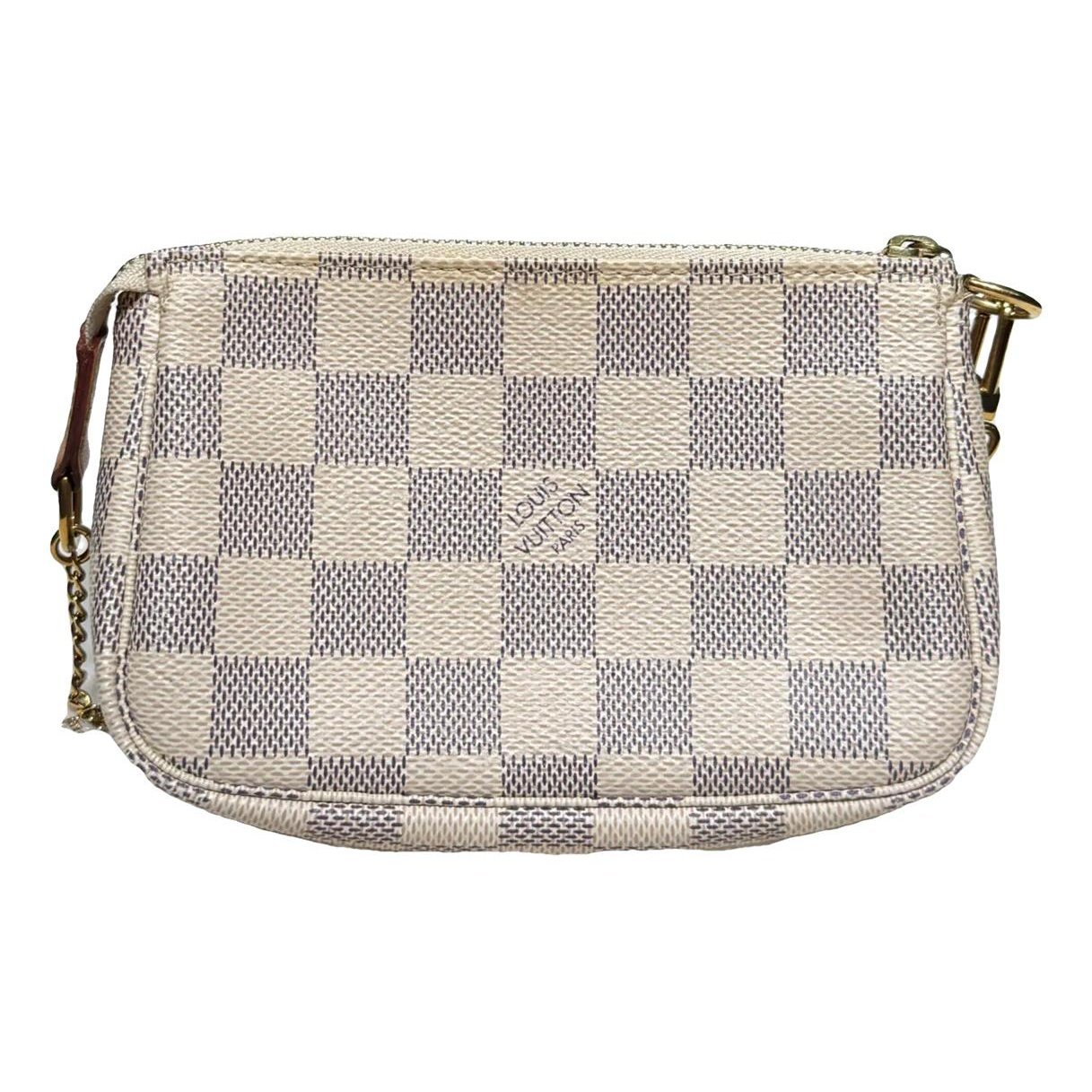 Pochette Accessoire vinyl handbag