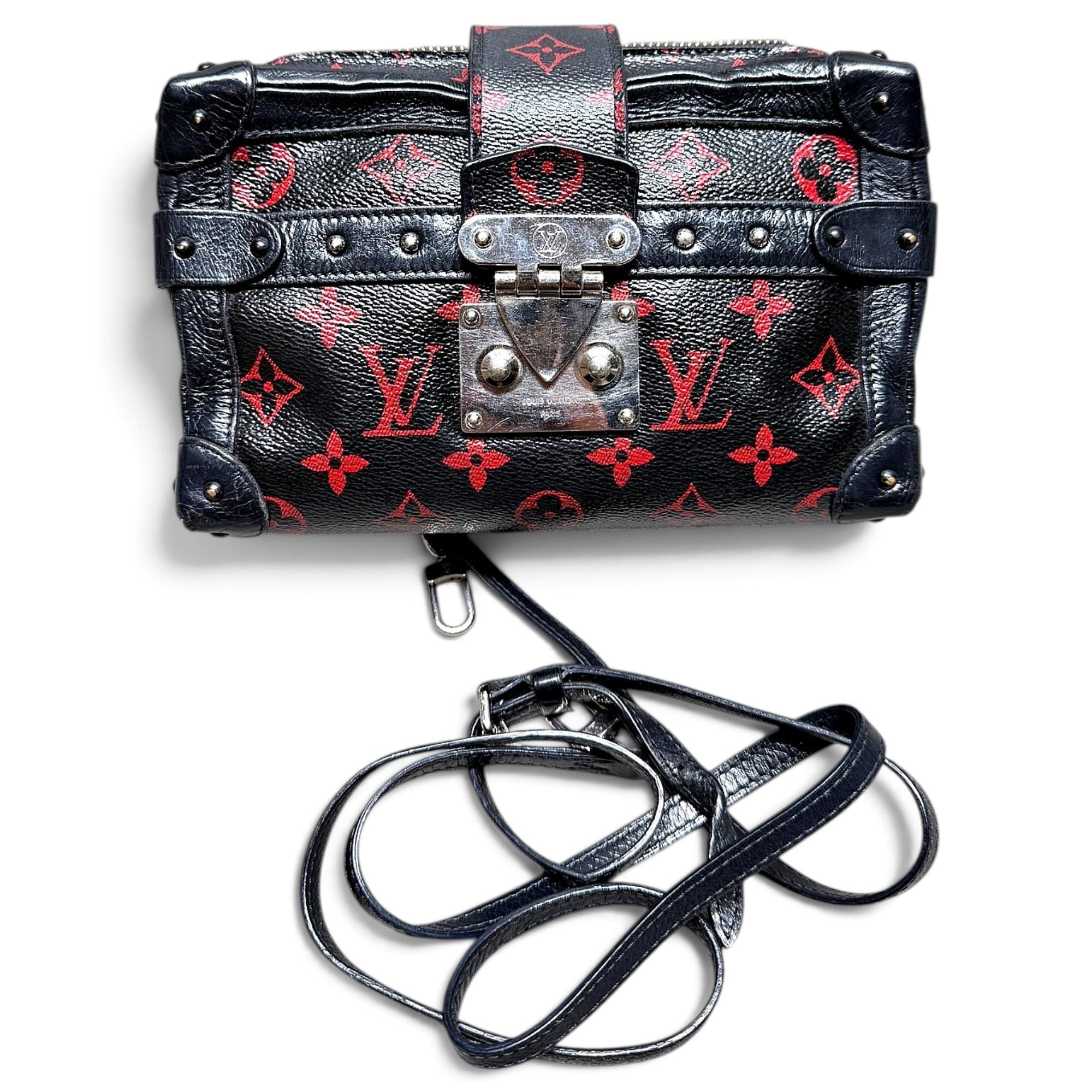 Pochette Trunk leather handbag