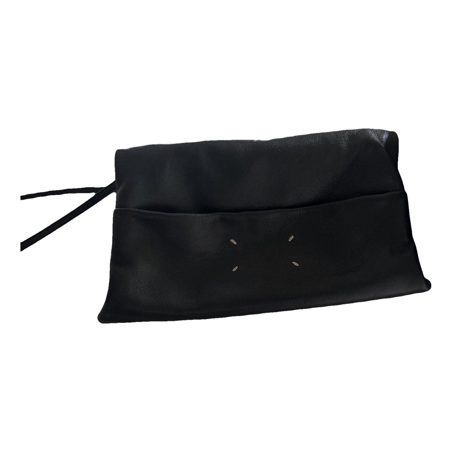 Snatched leather handbag