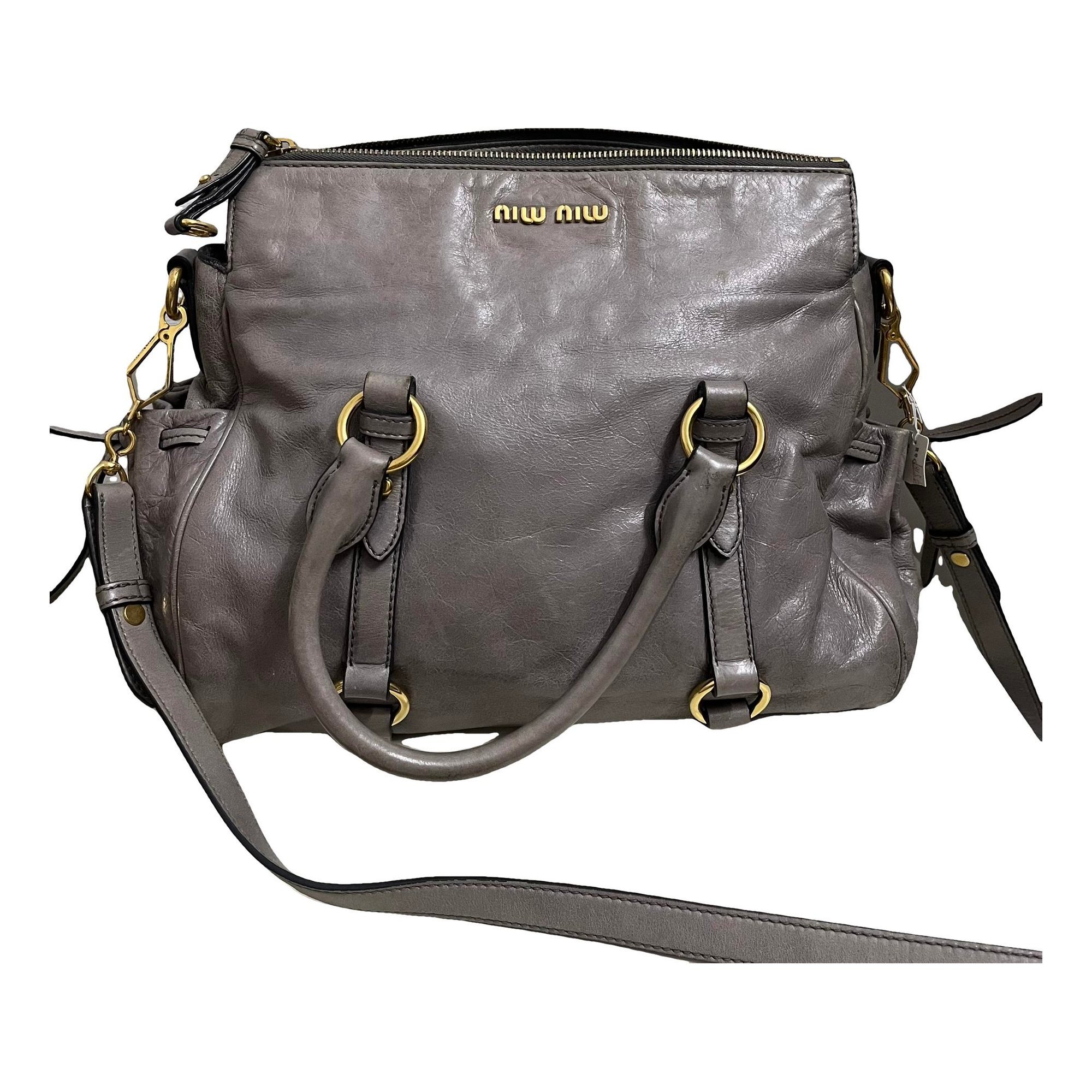 Bow bag leather handbag