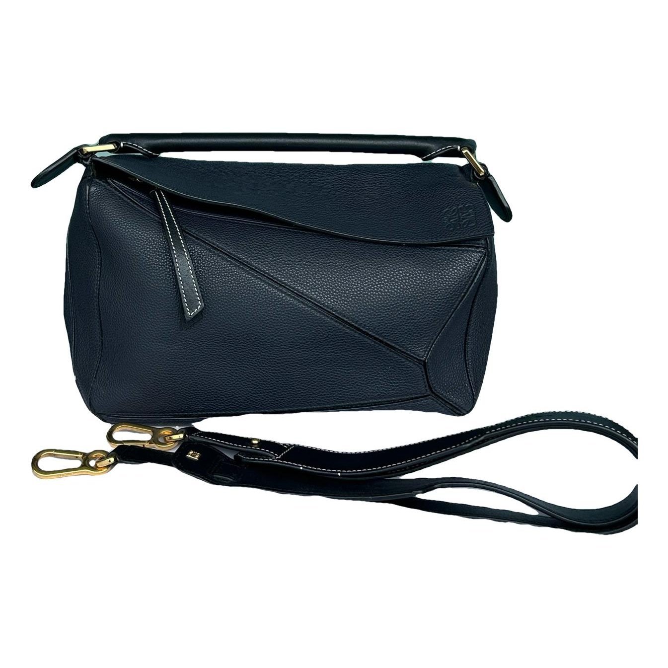Puzzle leather handbag
