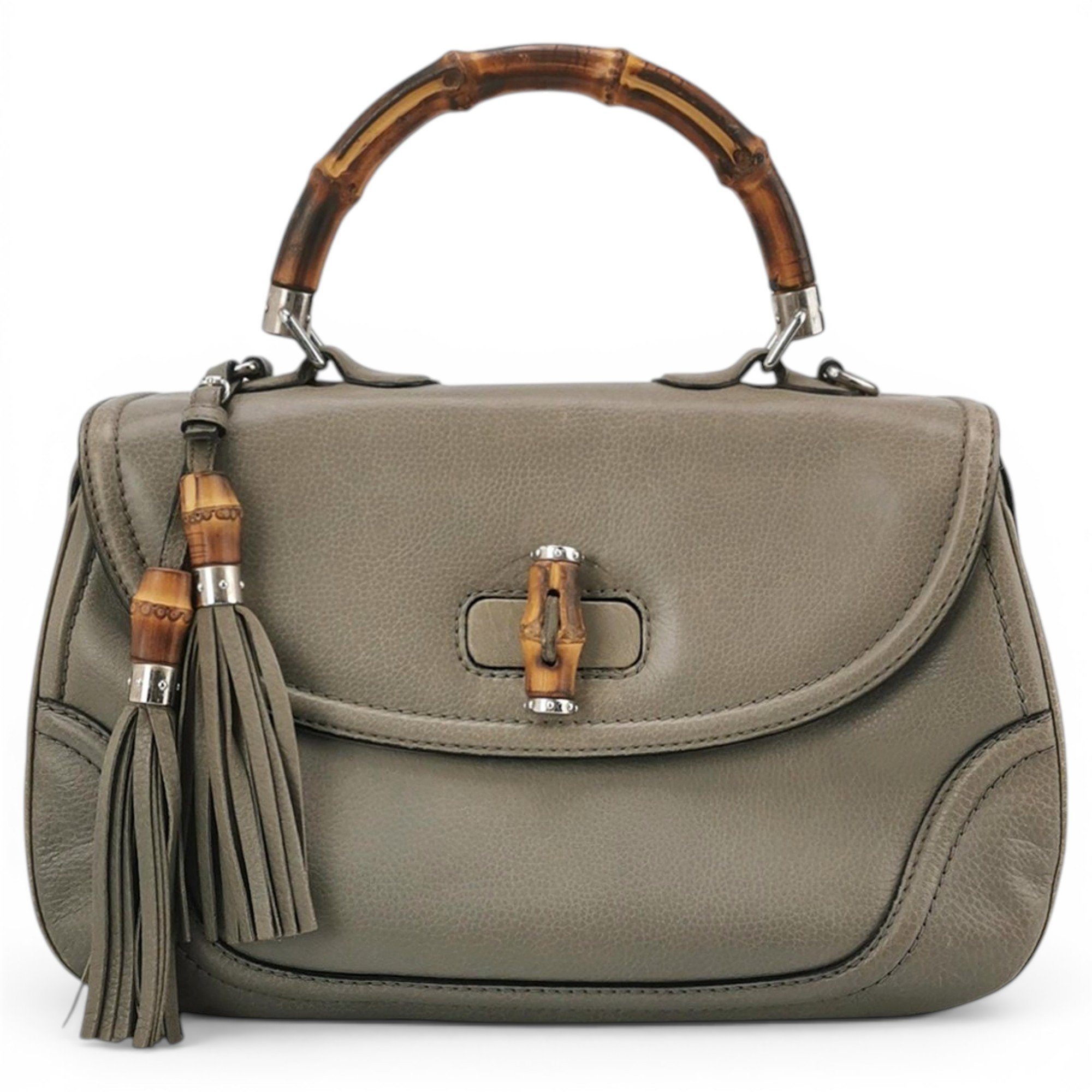 Convertible Pompon Bamboo Top Handle leather handbag