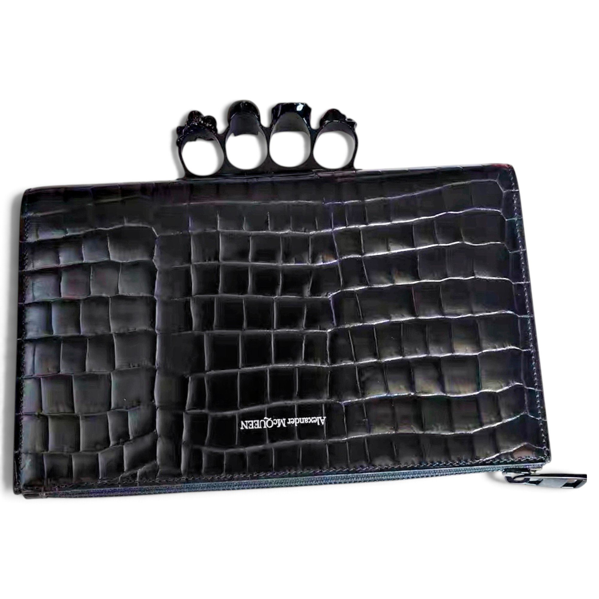 Knuckle leather clutch bag