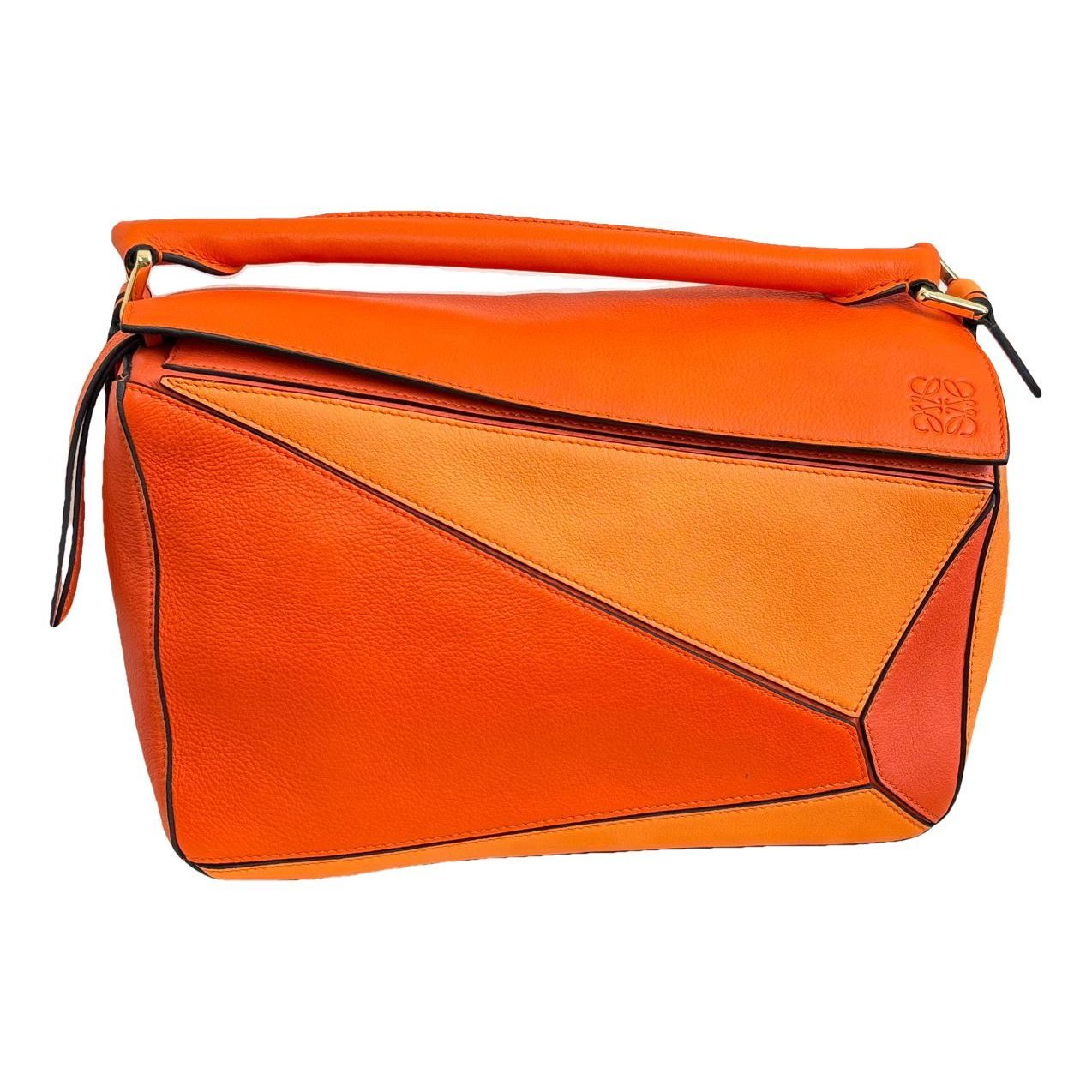 Puzzle leather handbag