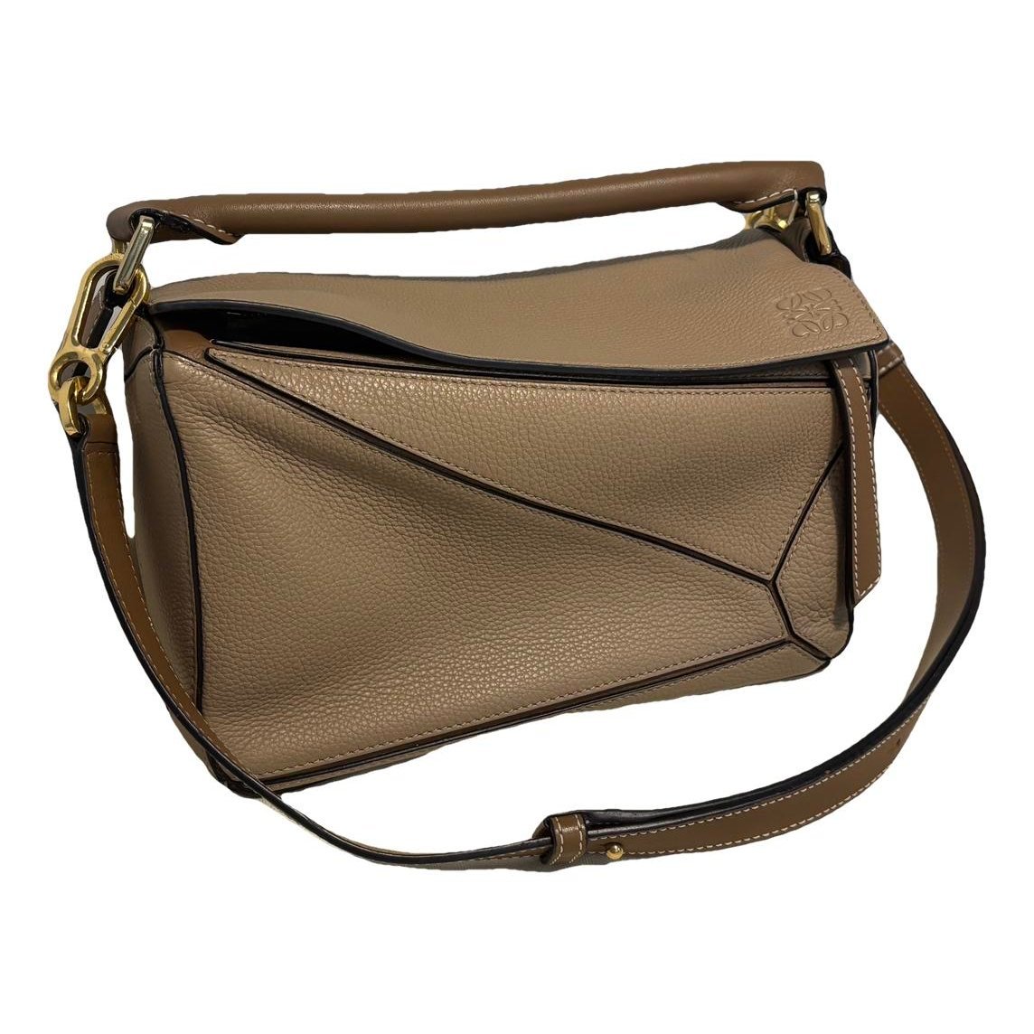 Puzzle leather handbag