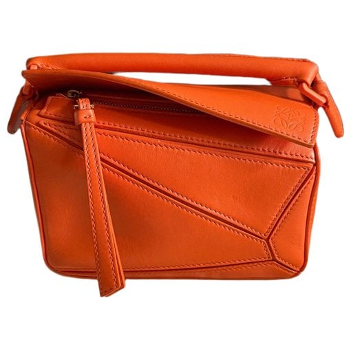 Puzzle leather handbag