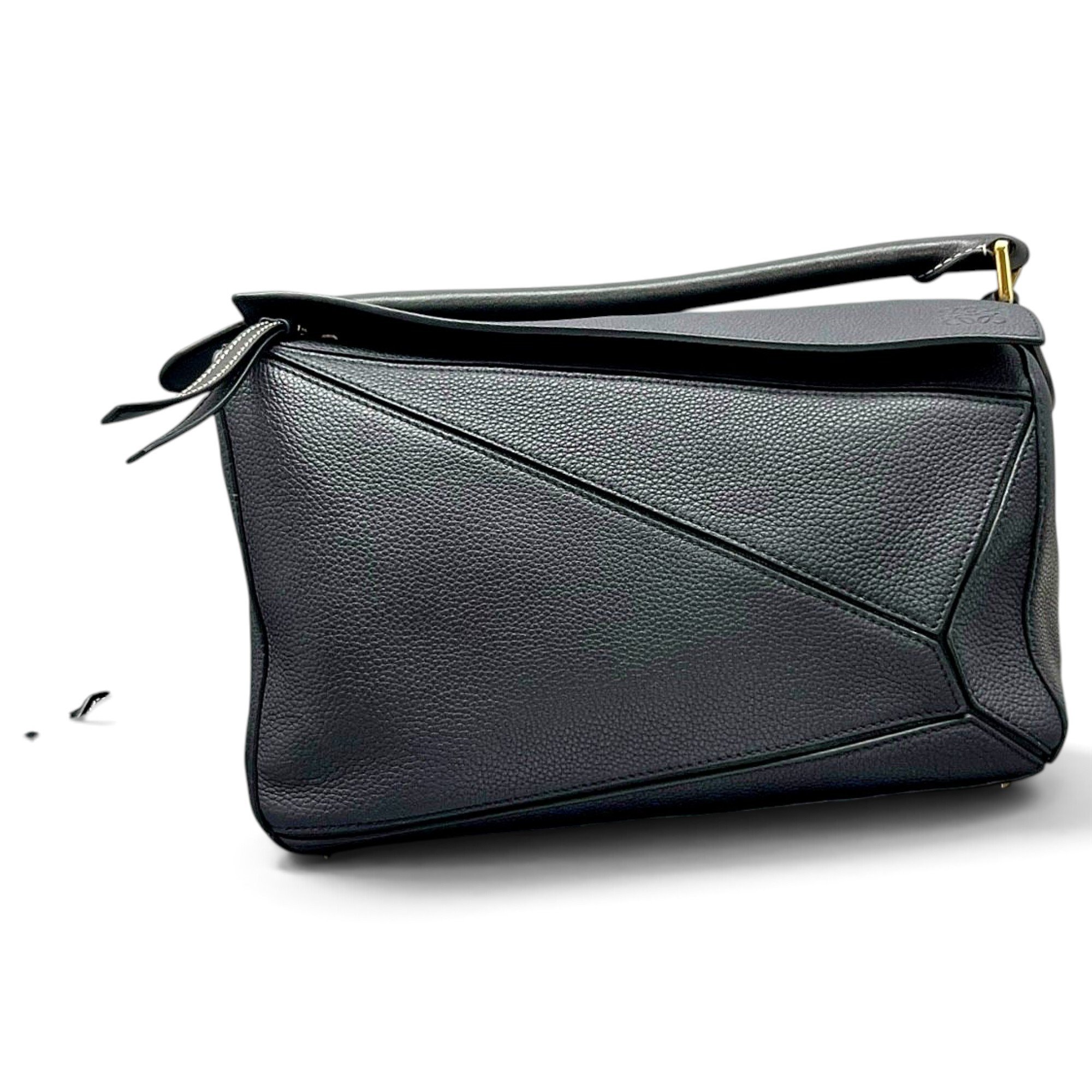 Puzzle leather handbag