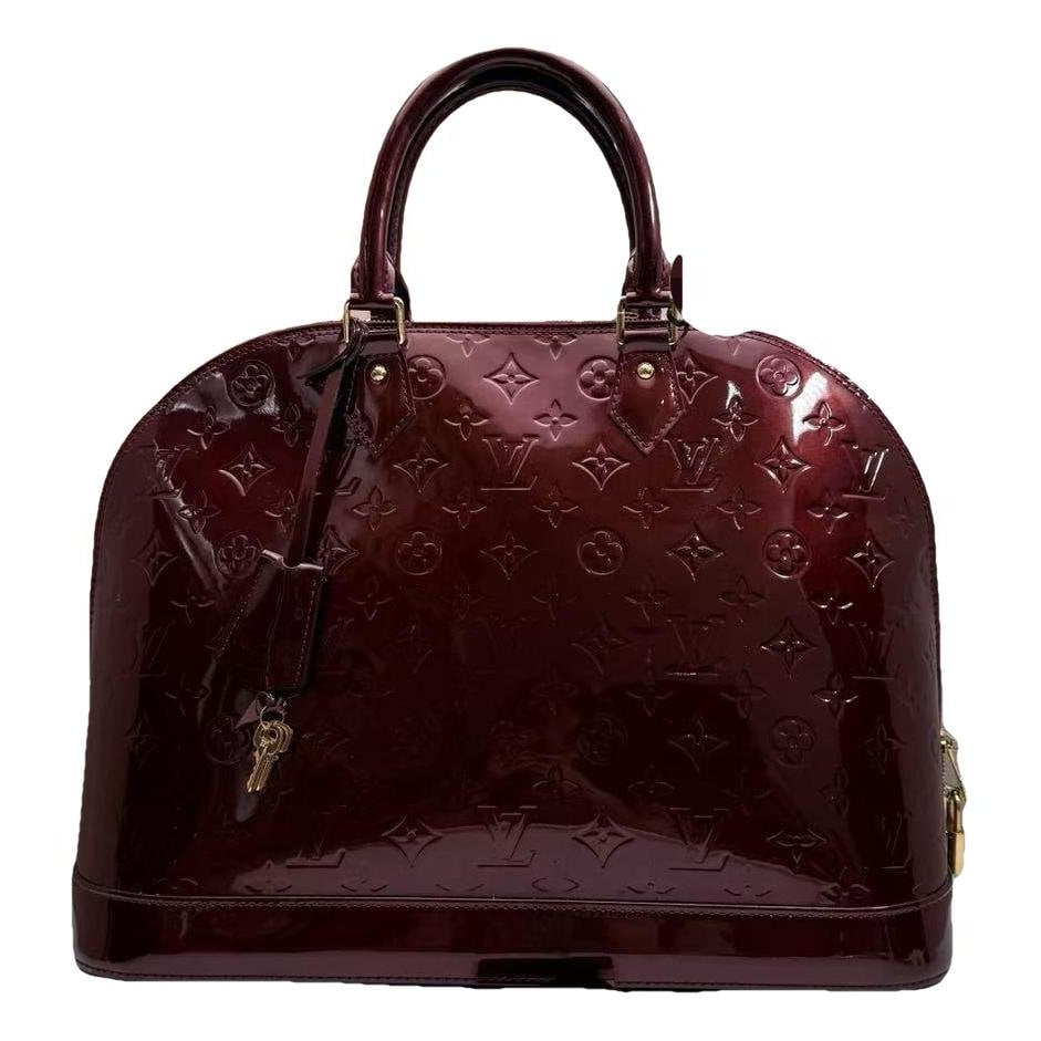 Alma BB patent leather handbag