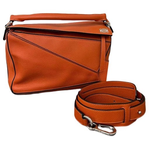 Puzzle leather handbag