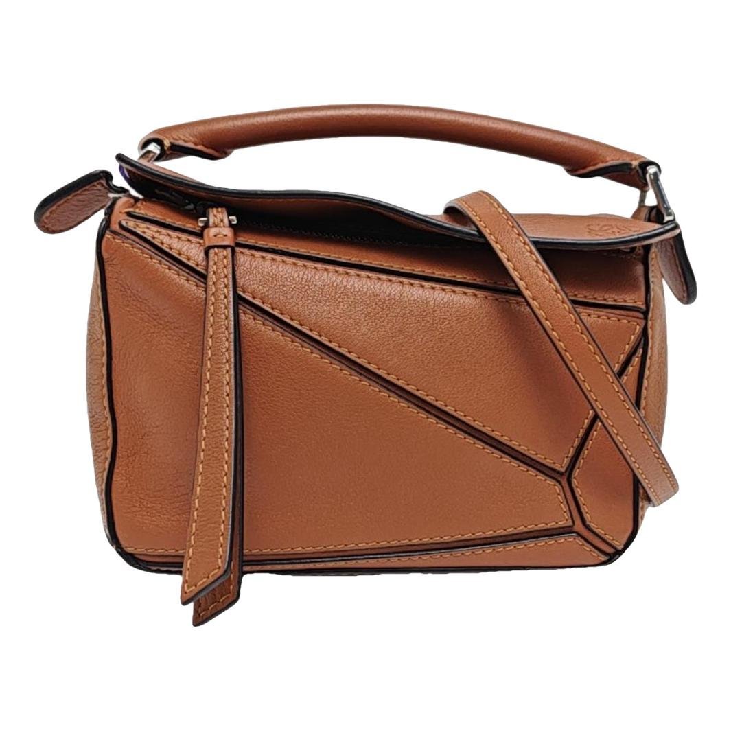 Puzzle leather handbag