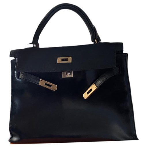 Kelly 32 patent leather handbag