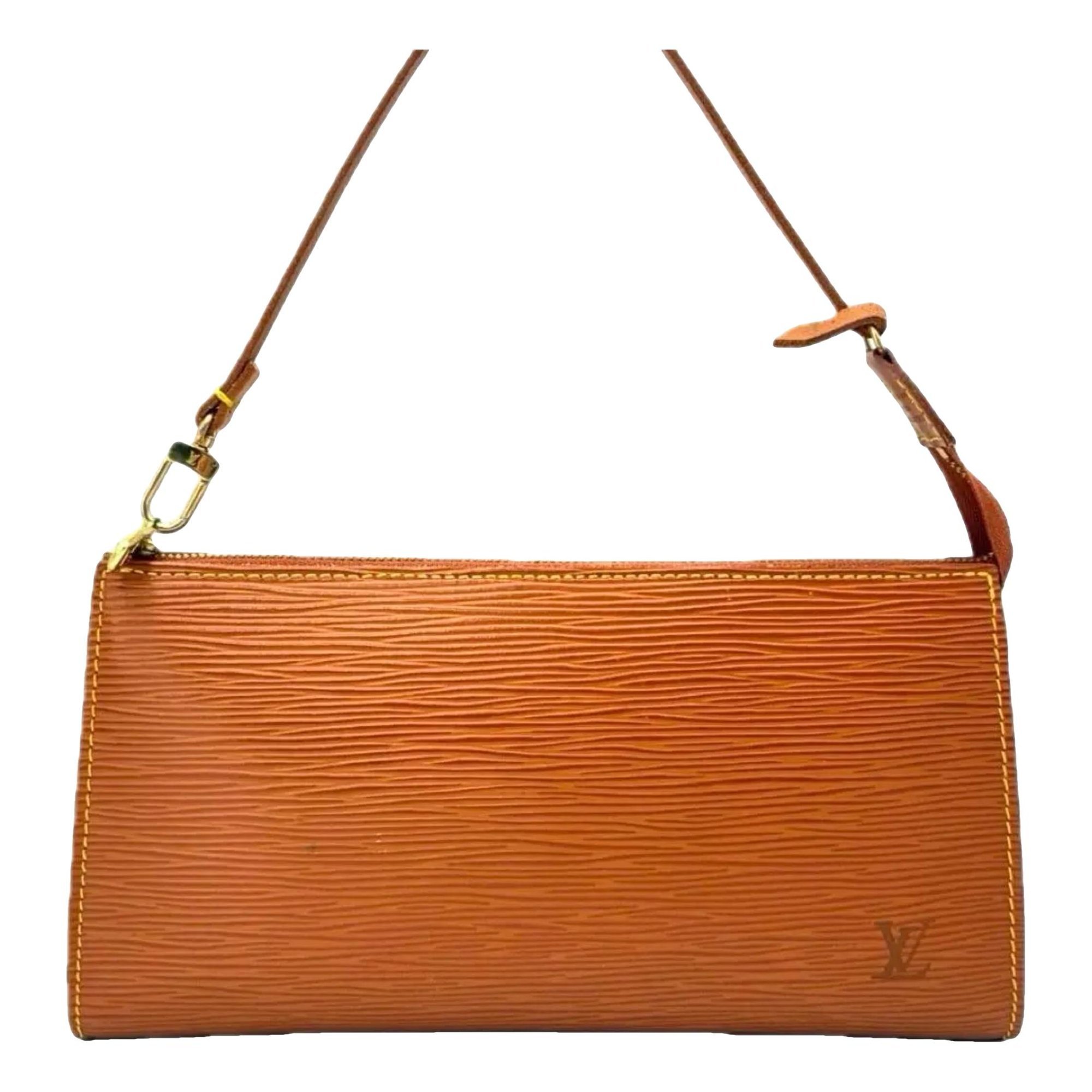 Pochette Accessoire patent leather handbag