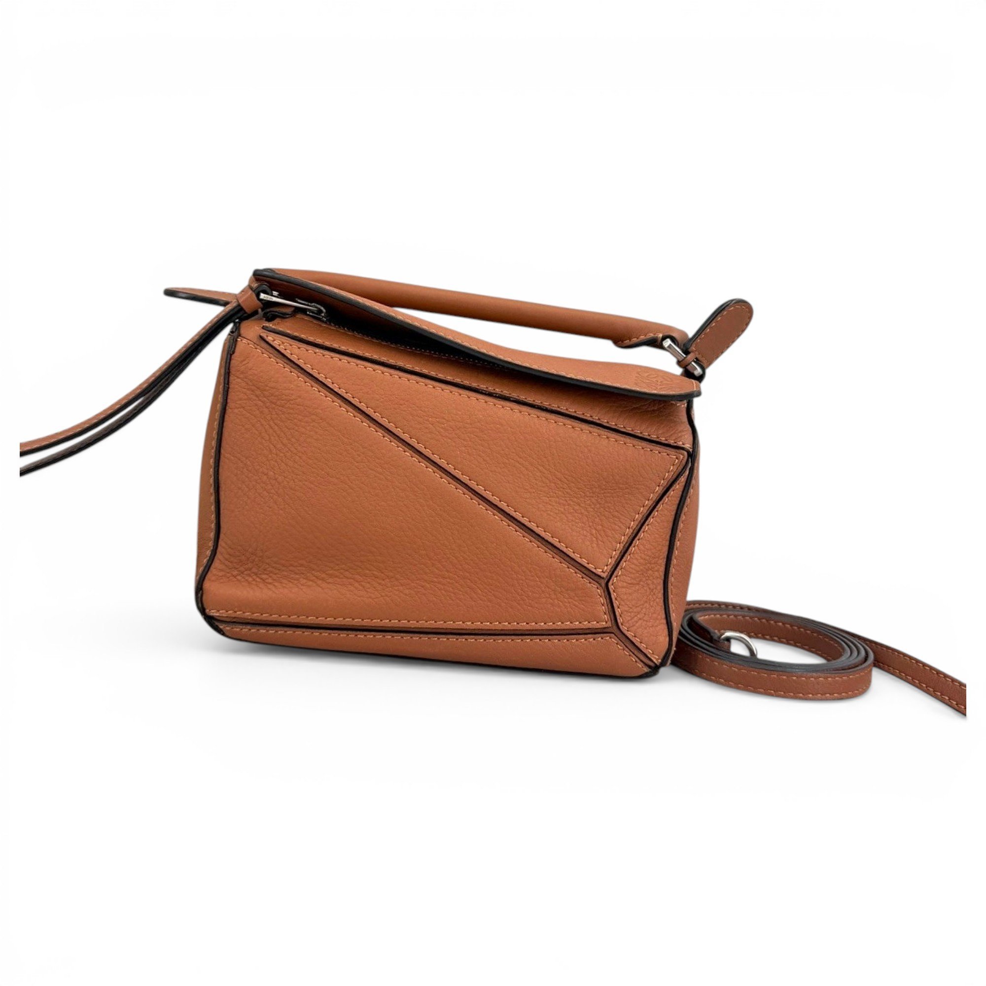 Puzzle leather handbag