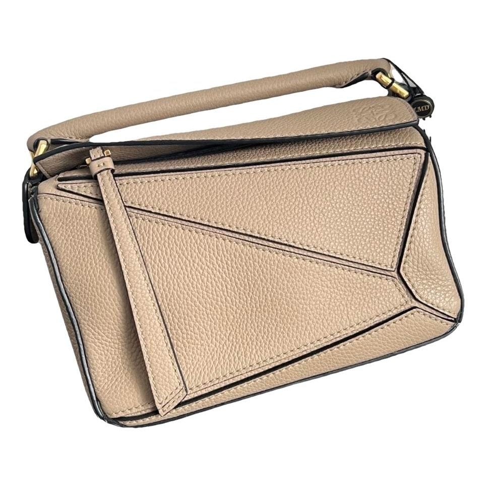 Puzzle leather handbag