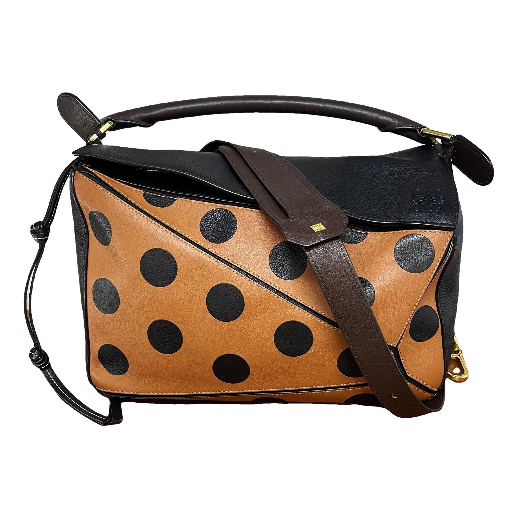 Puzzle leather handbag