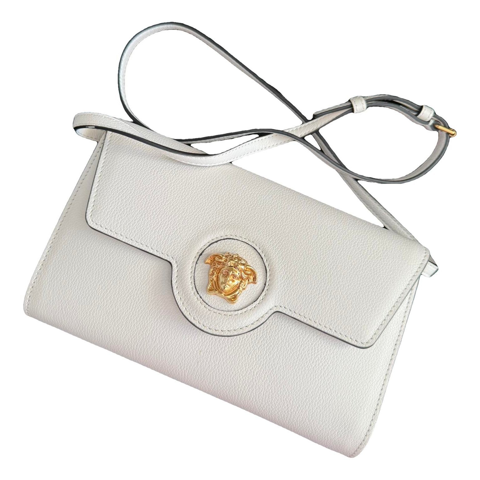 La Medusa leather clutch bag