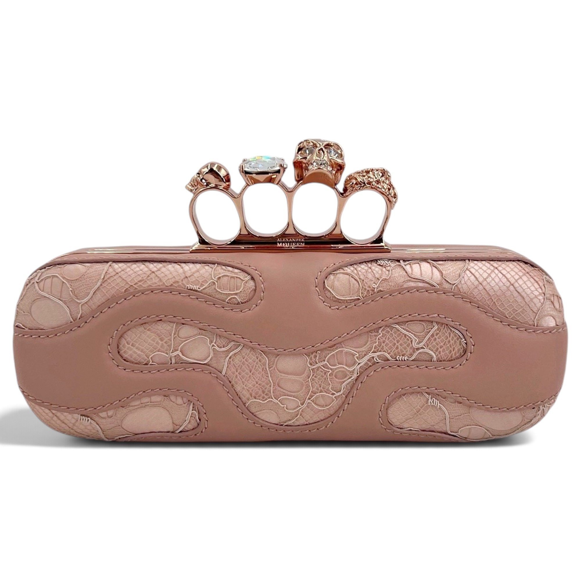Knuckle leather clutch bag