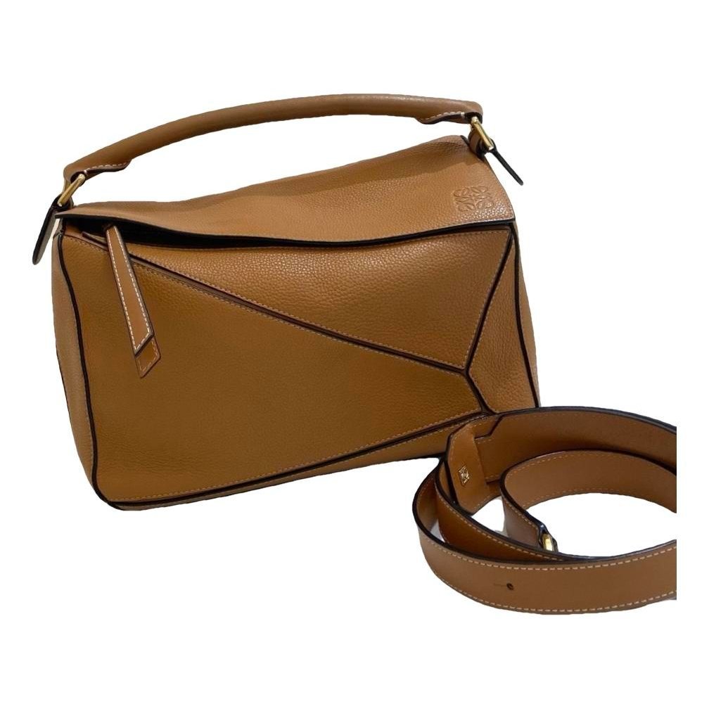 Puzzle leather handbag