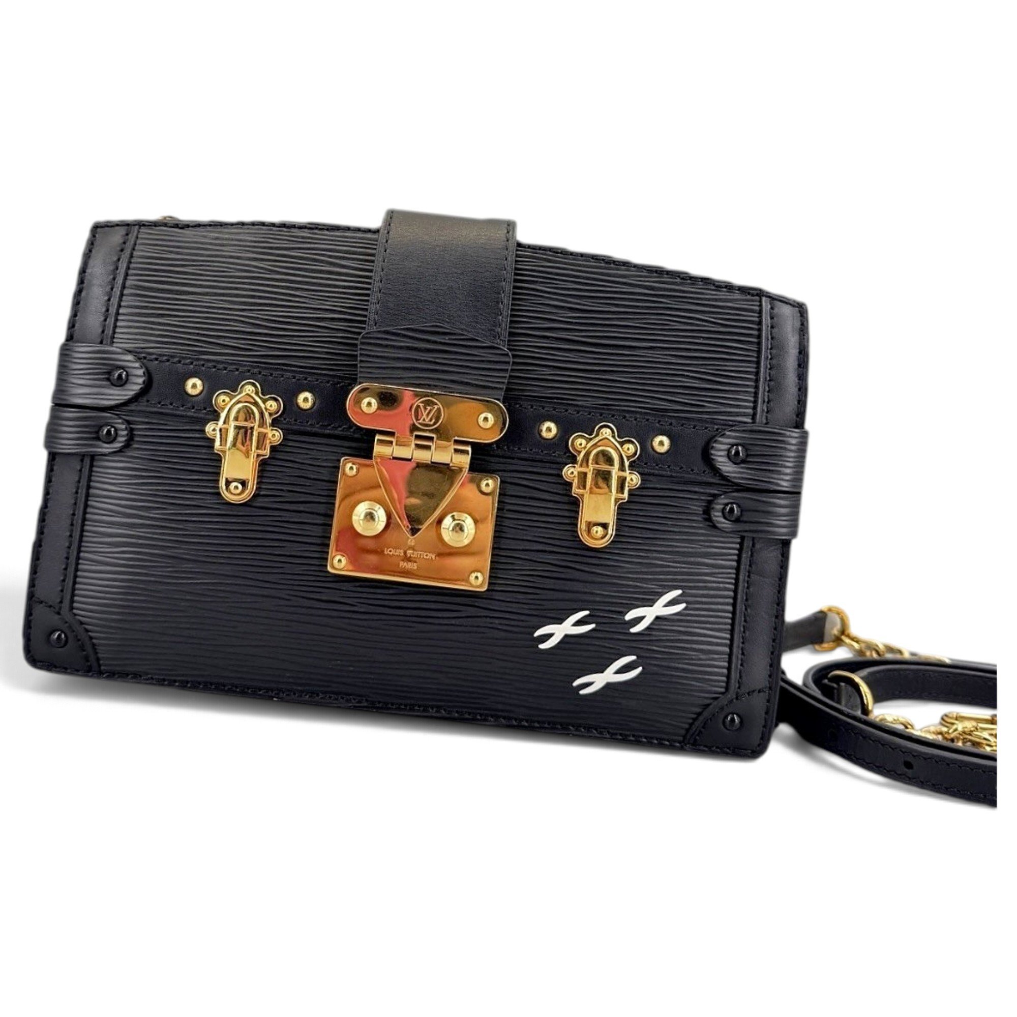 Pochette Trunk leather handbag