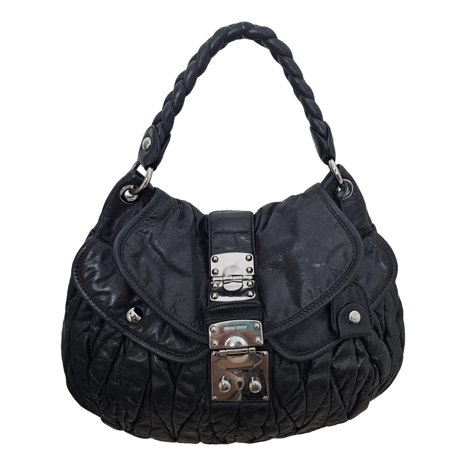 Coffer leather handbag
