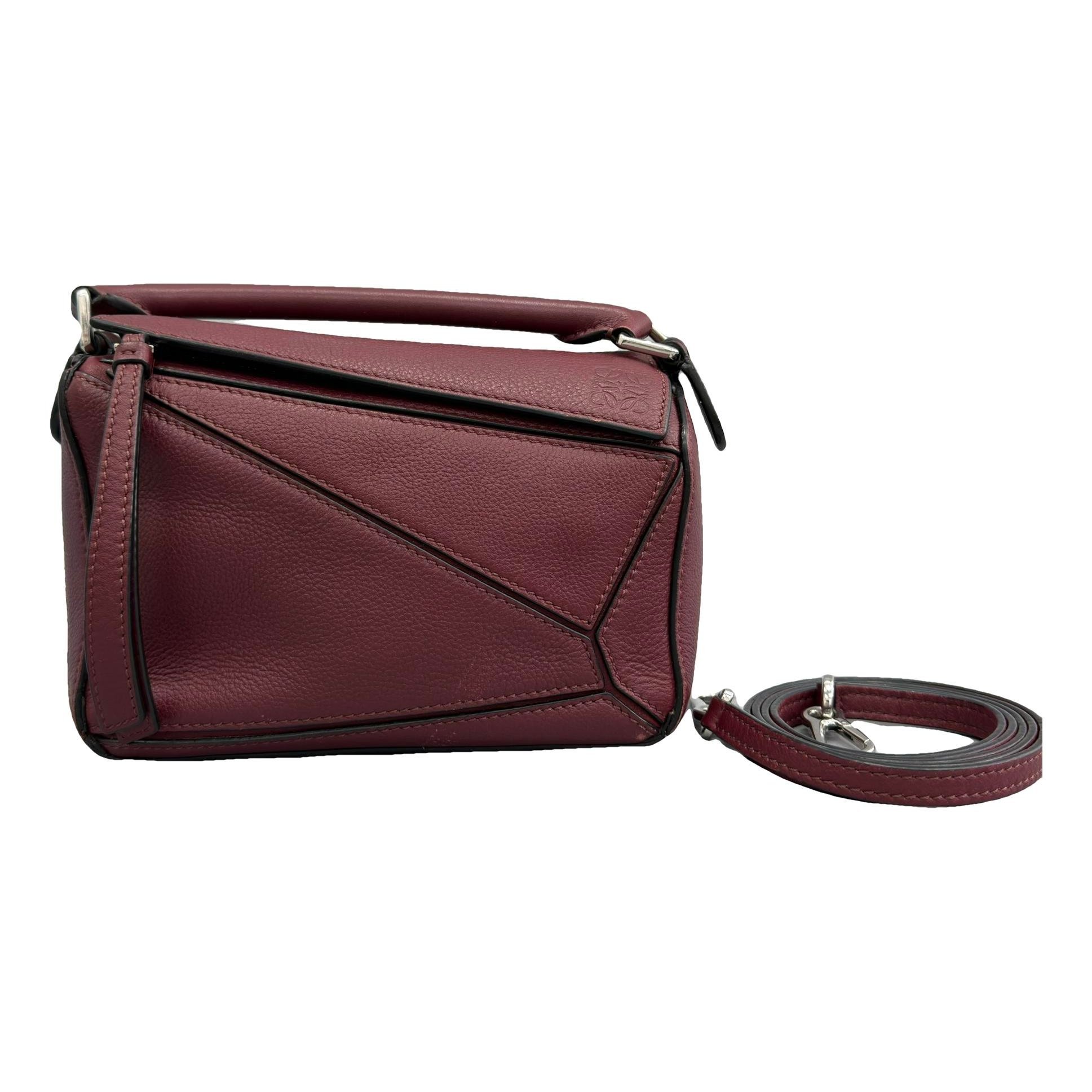 Puzzle leather handbag