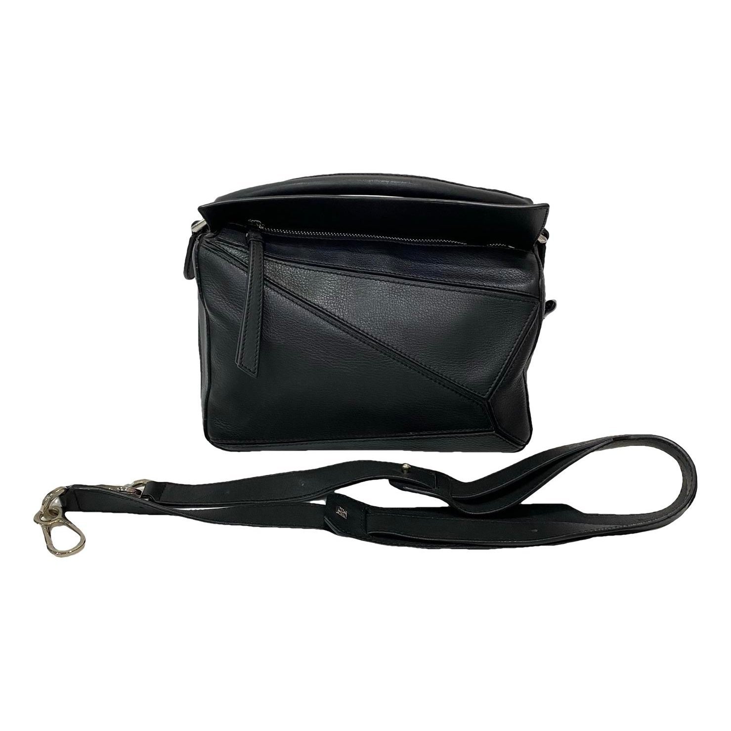 Puzzle leather handbag