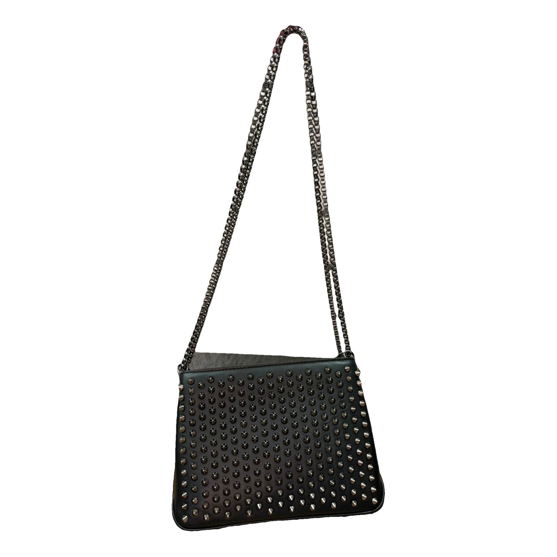 Triloubi leather handbag