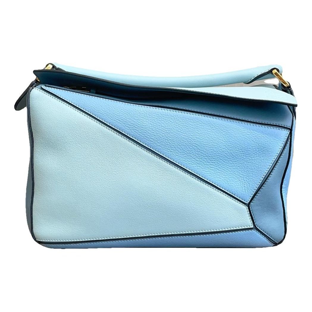 Puzzle leather handbag