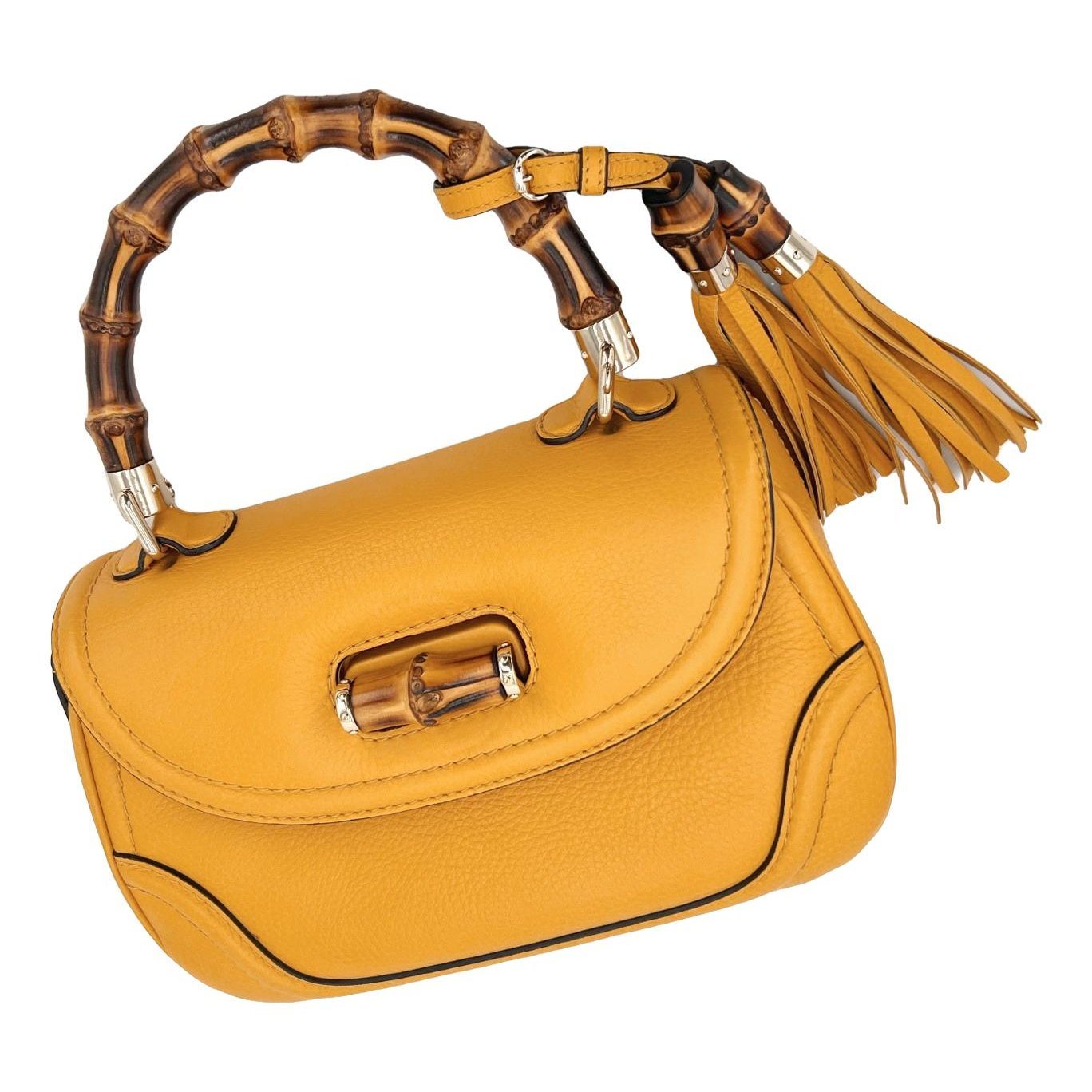 Convertible Pompon Bamboo Top Handle leather handbag