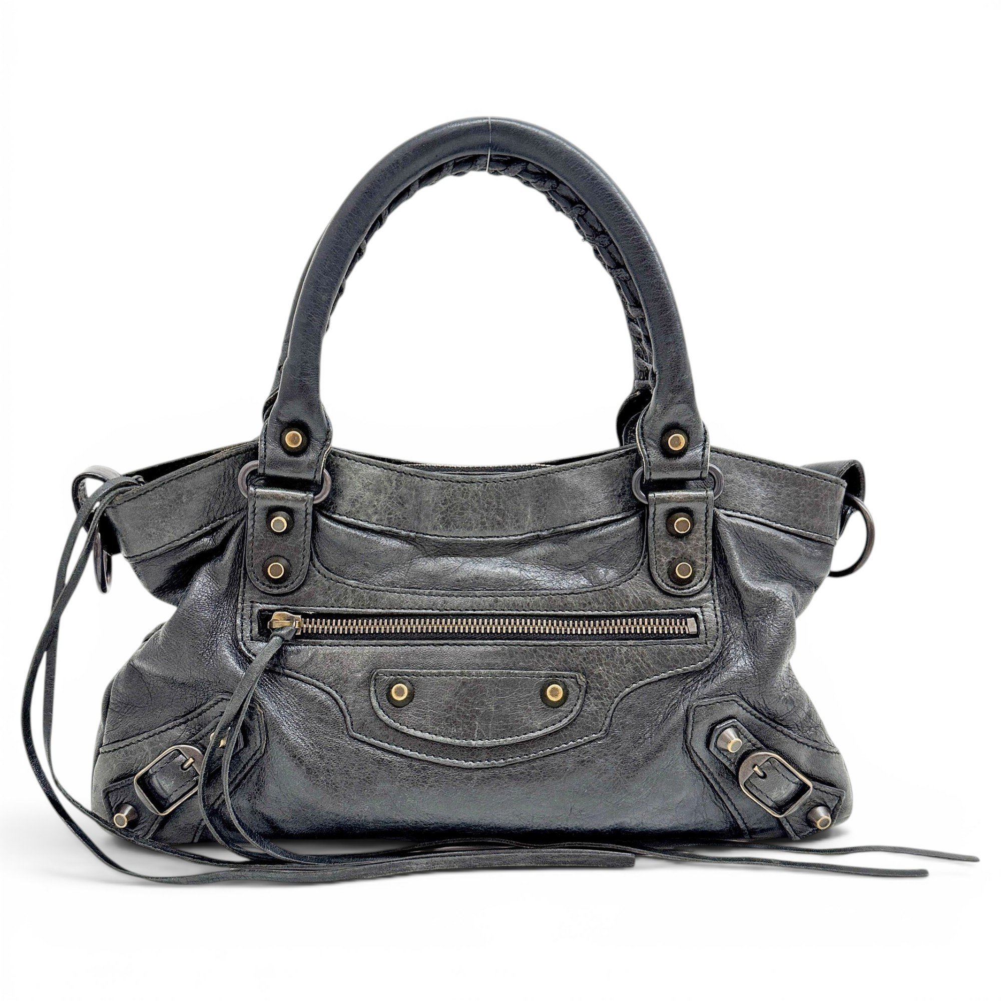 First leather handbag