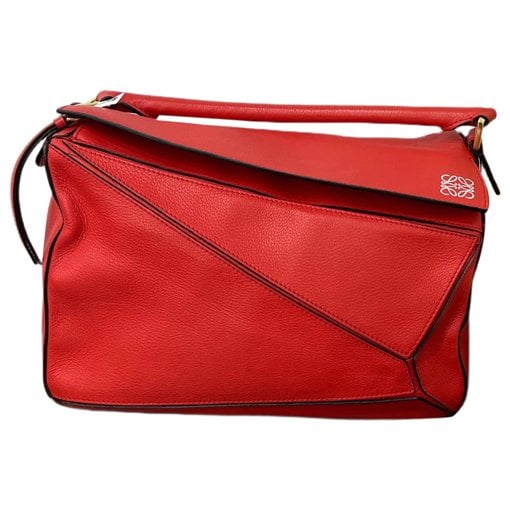Puzzle leather handbag