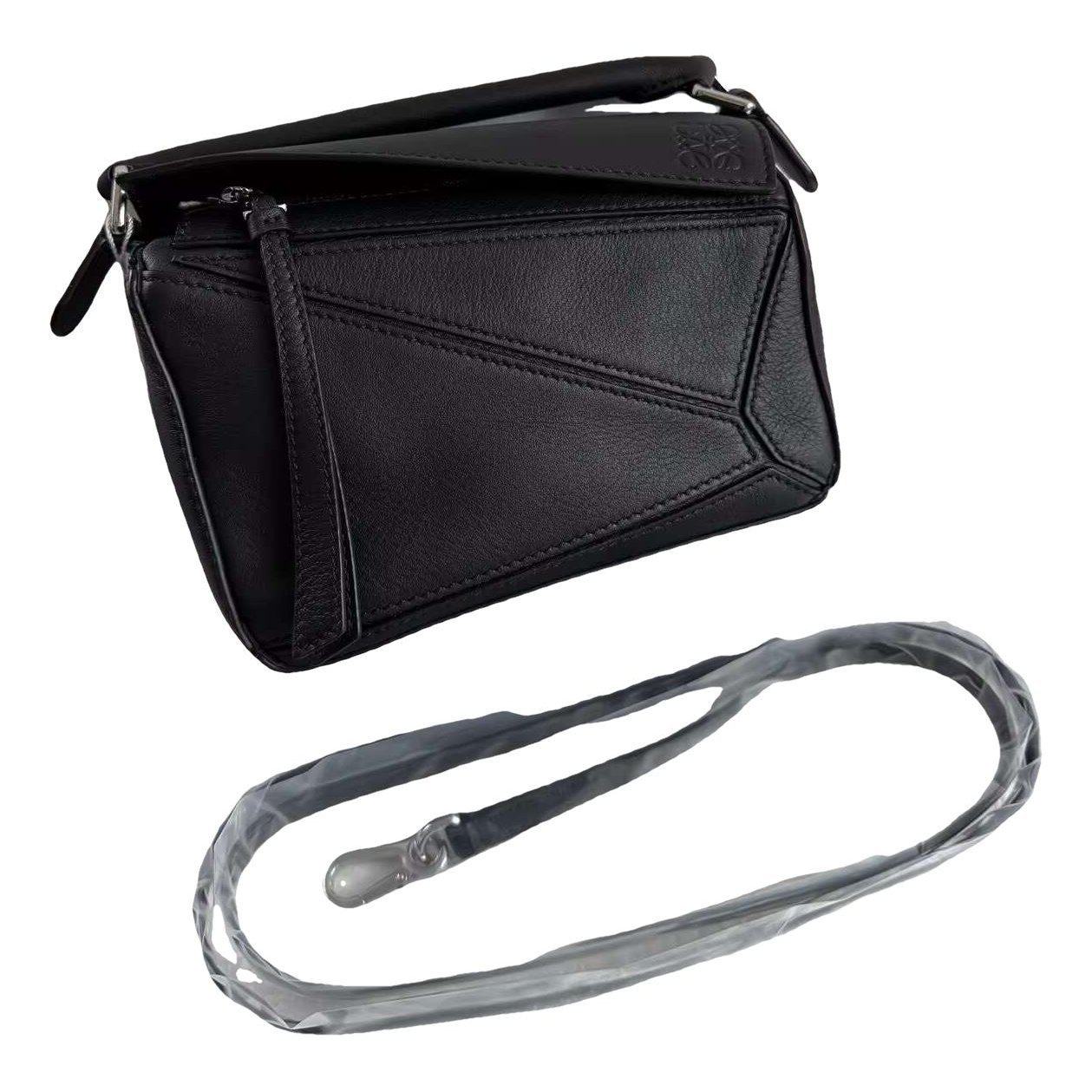 Puzzle leather handbag