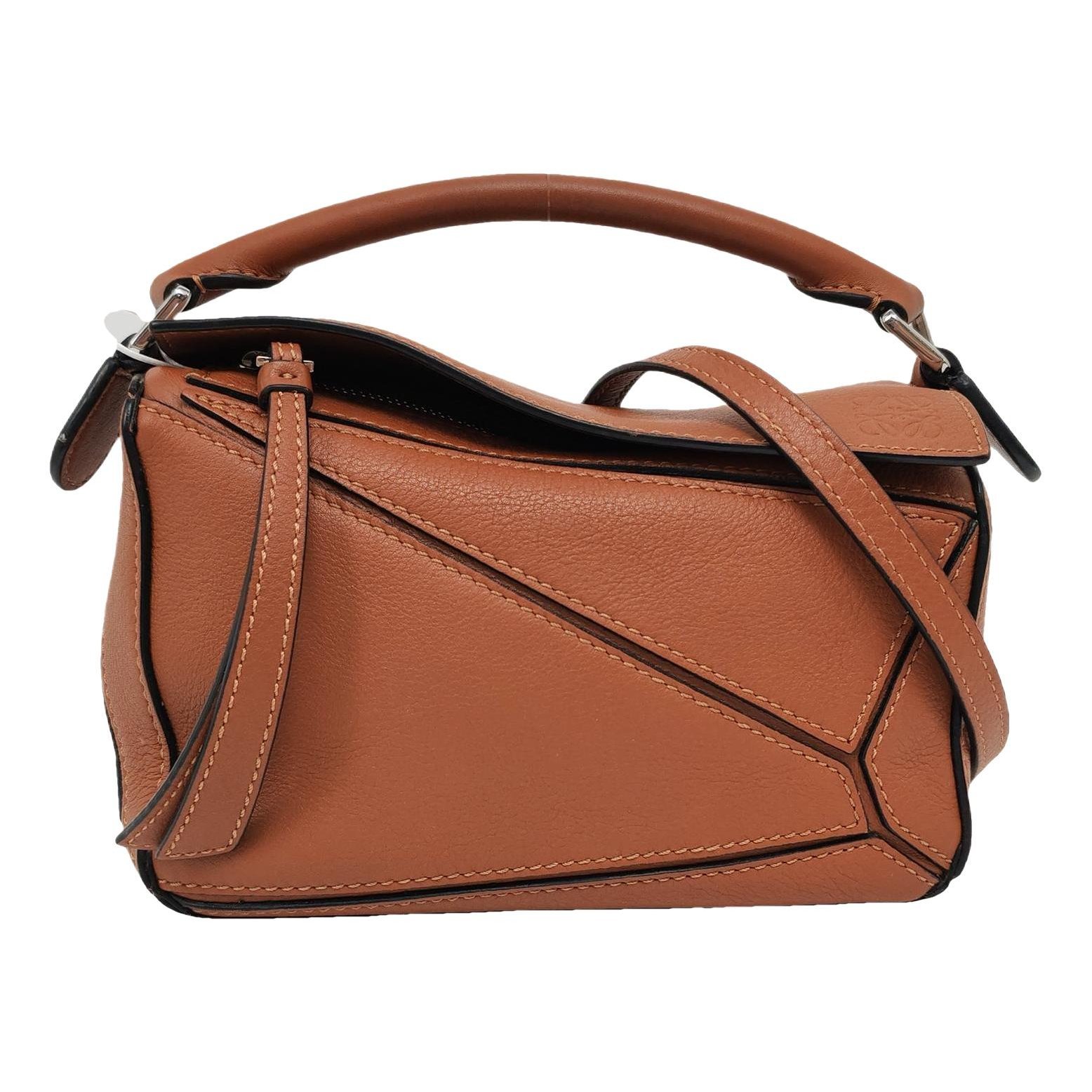 Puzzle leather handbag