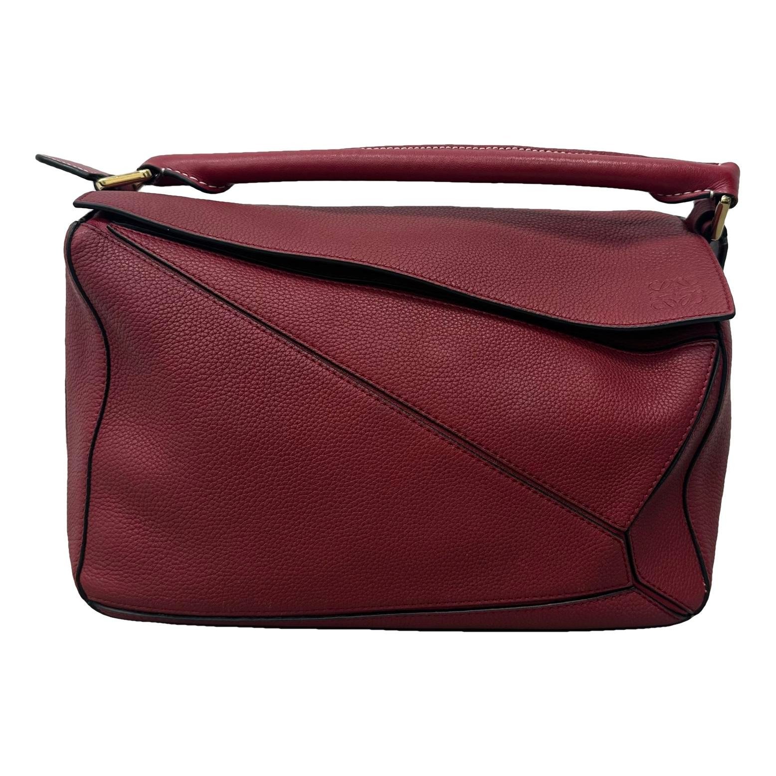 Puzzle leather handbag