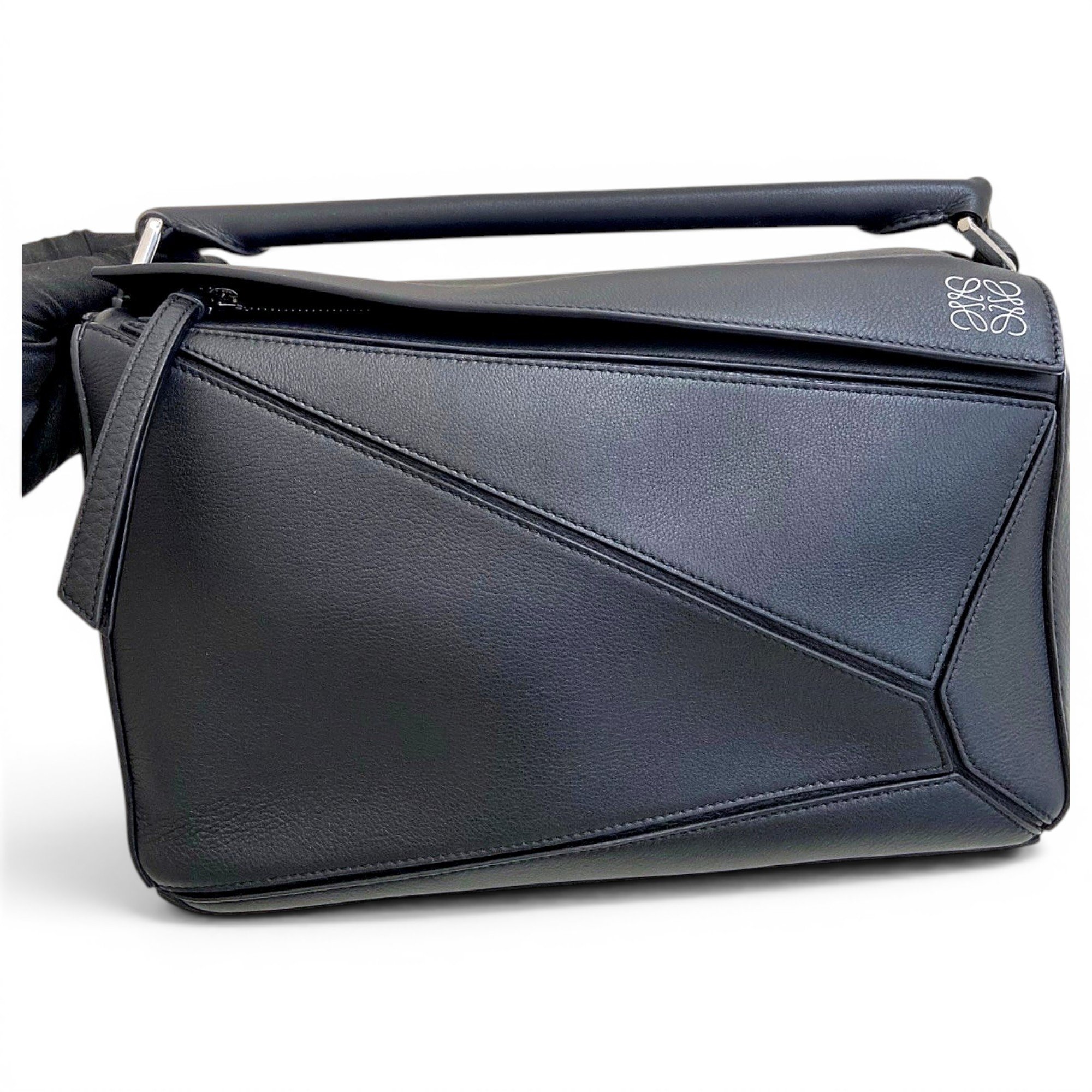 Puzzle leather handbag