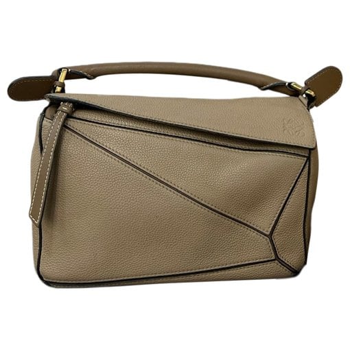 Puzzle leather handbag