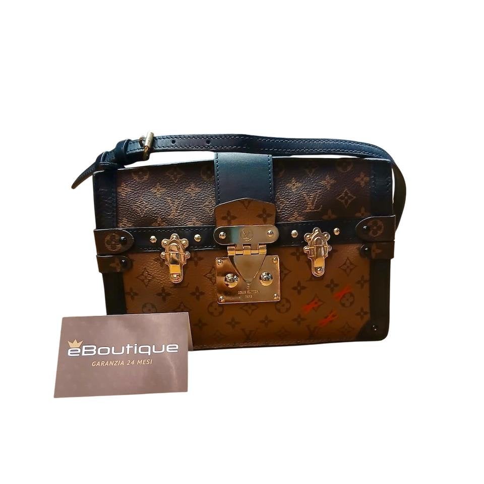 Pochette Trunk leather handbag
