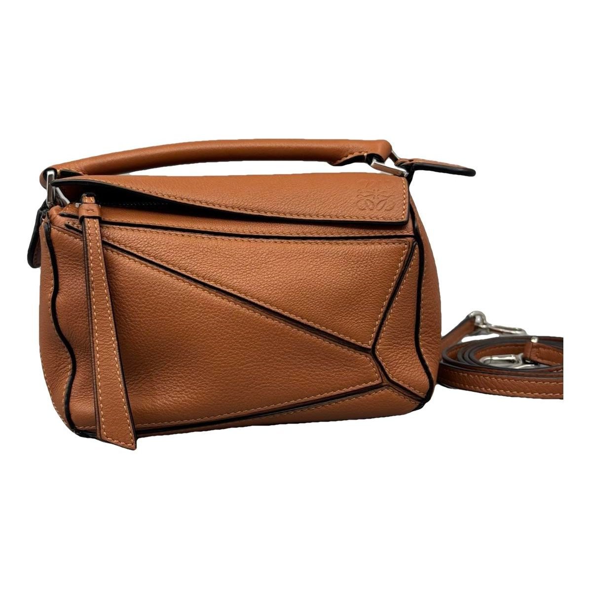 Puzzle leather handbag