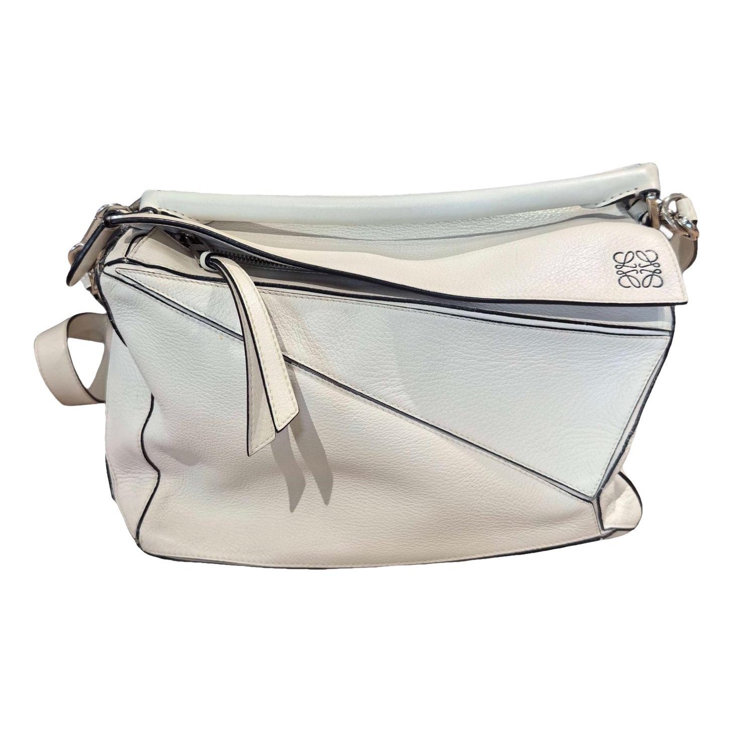 Puzzle leather handbag