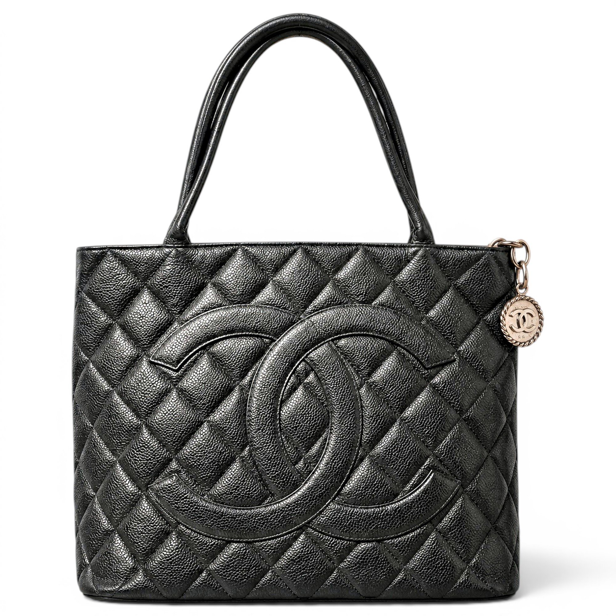 Médaillon leather handbag