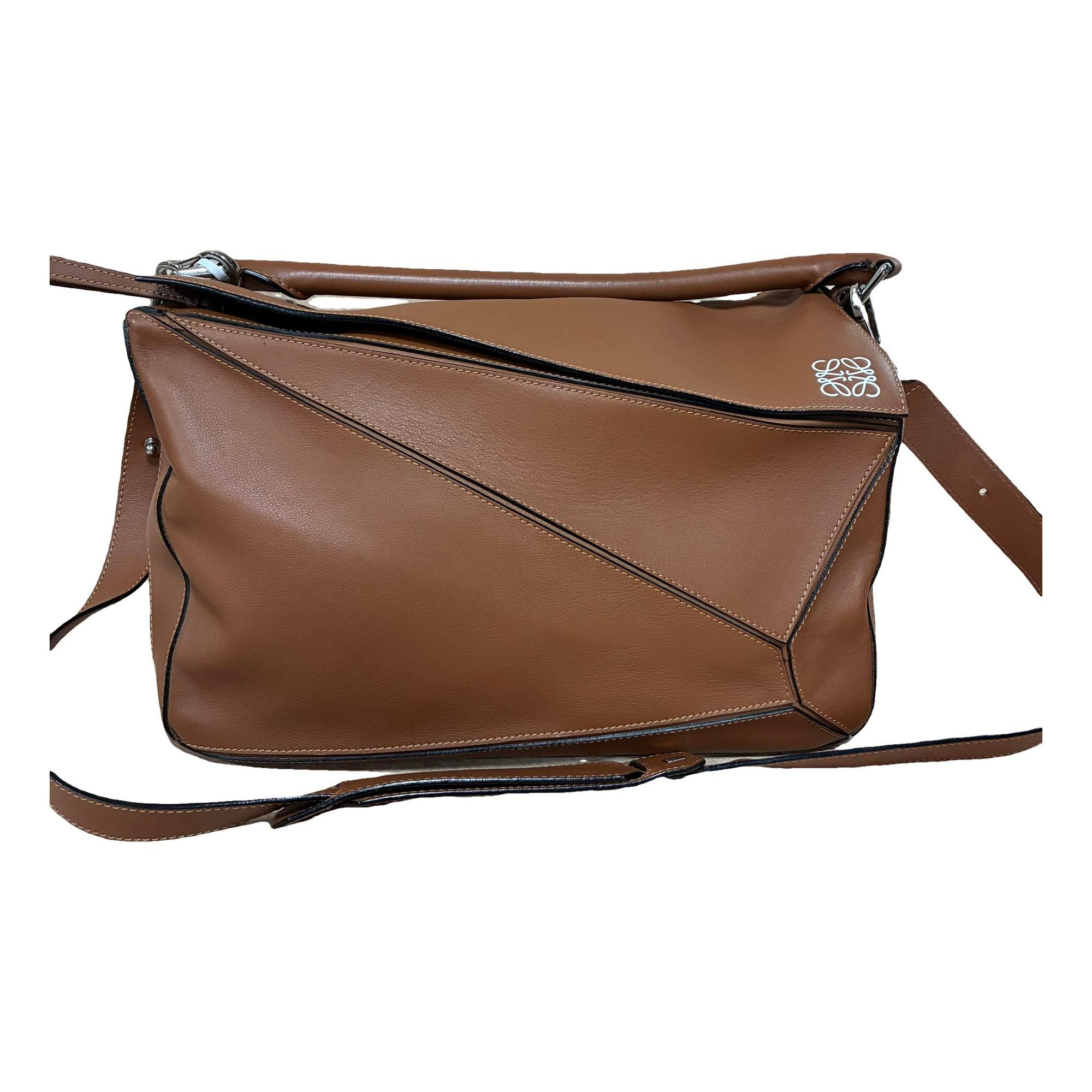 Puzzle leather handbag