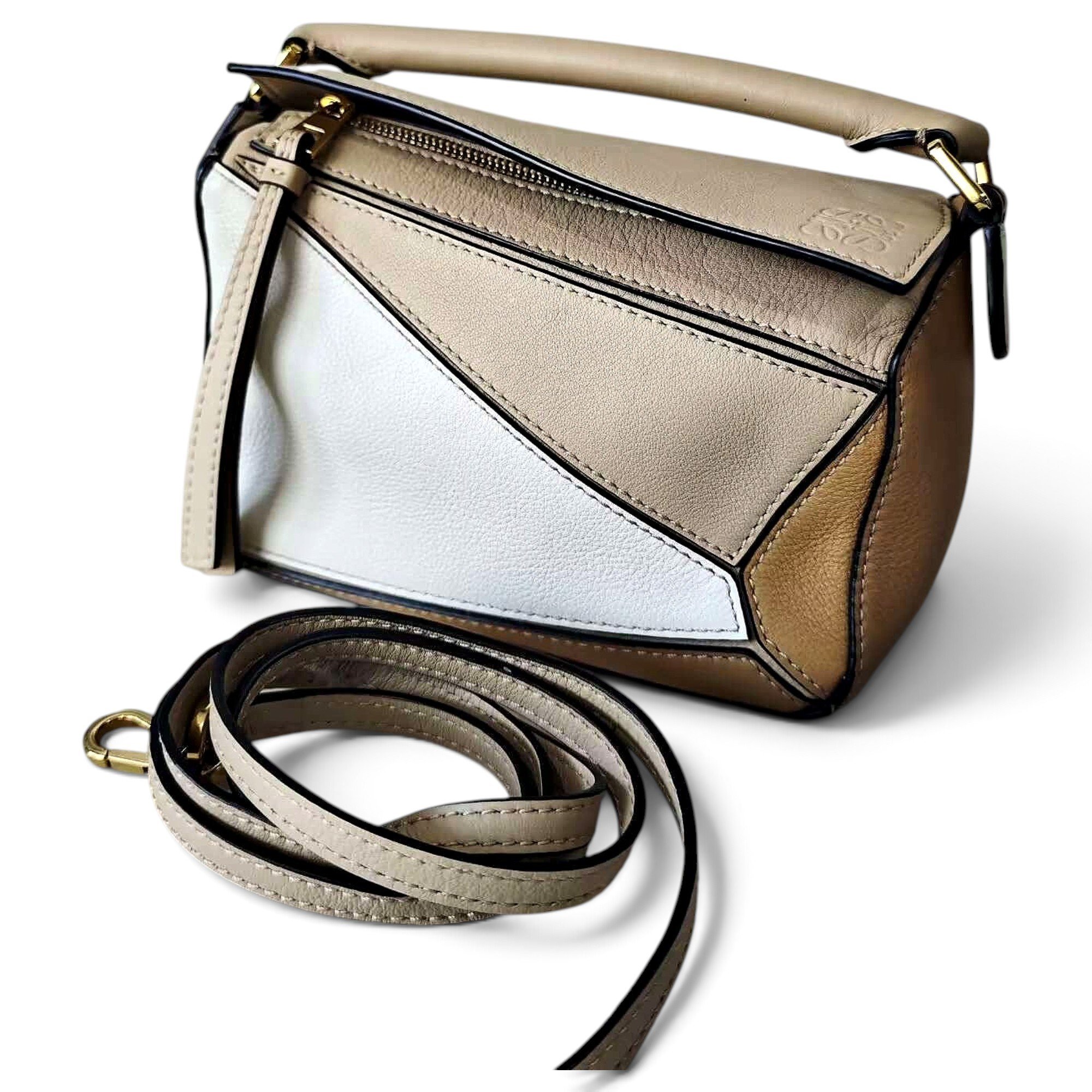 Puzzle leather handbag