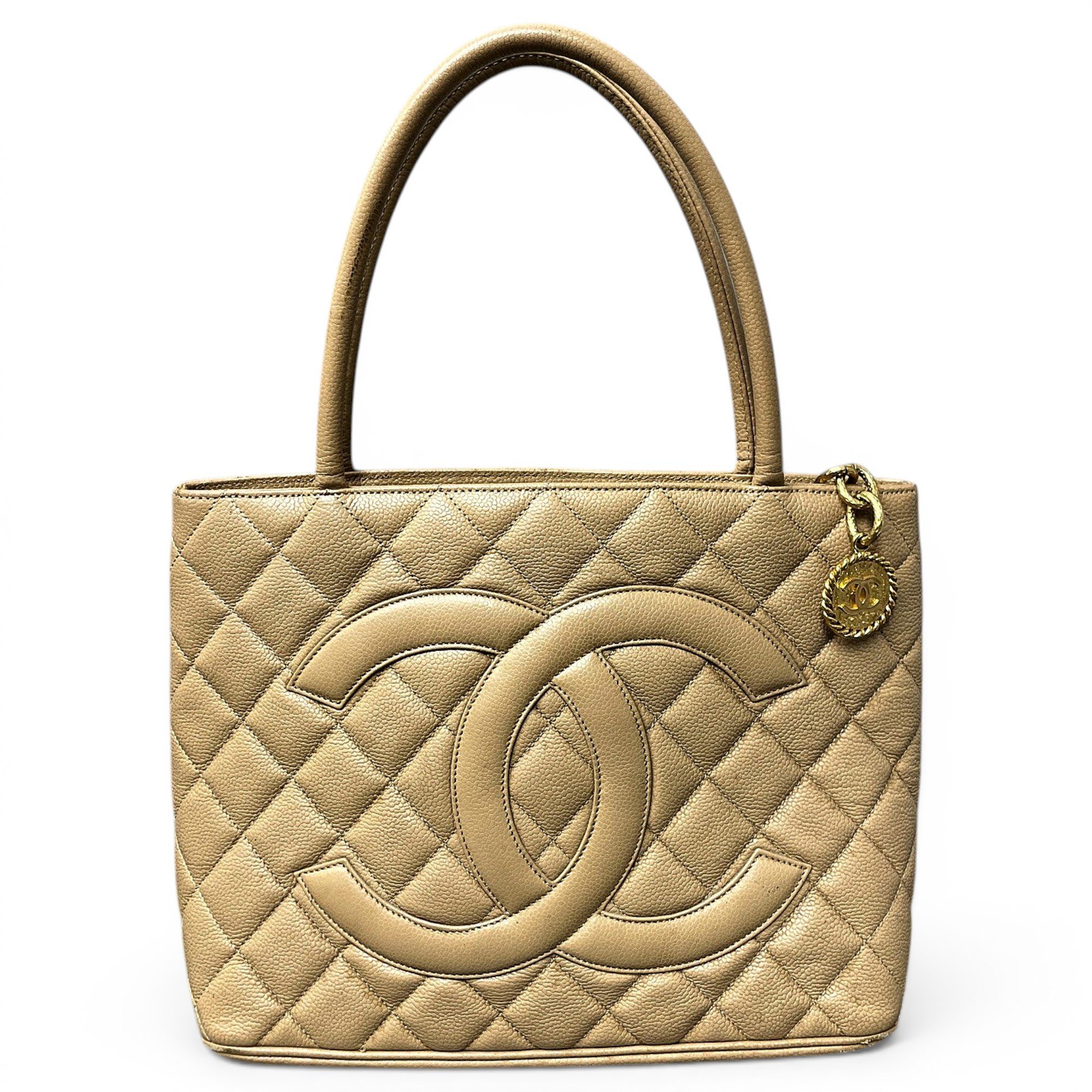Médaillon leather handbag