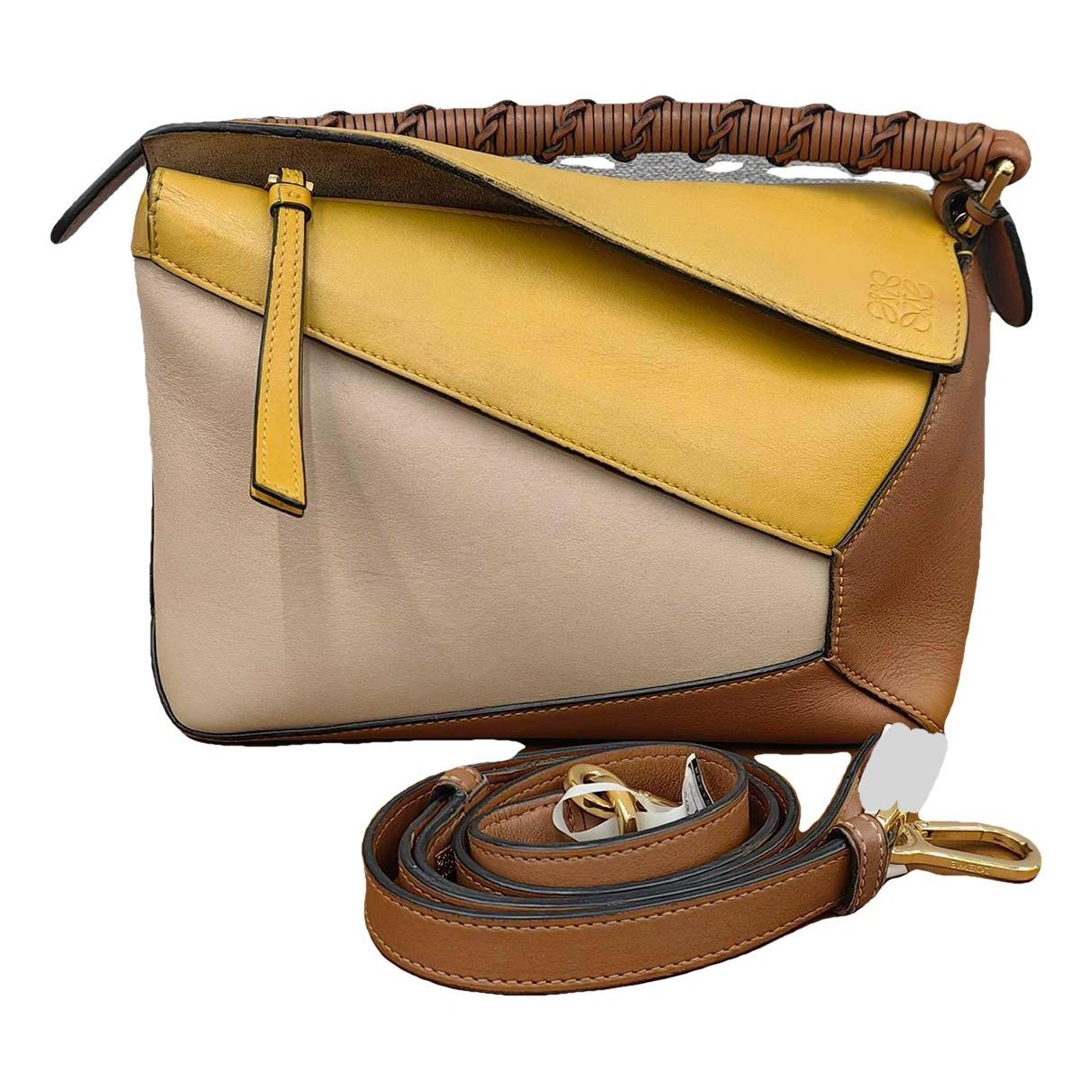 Puzzle leather handbag