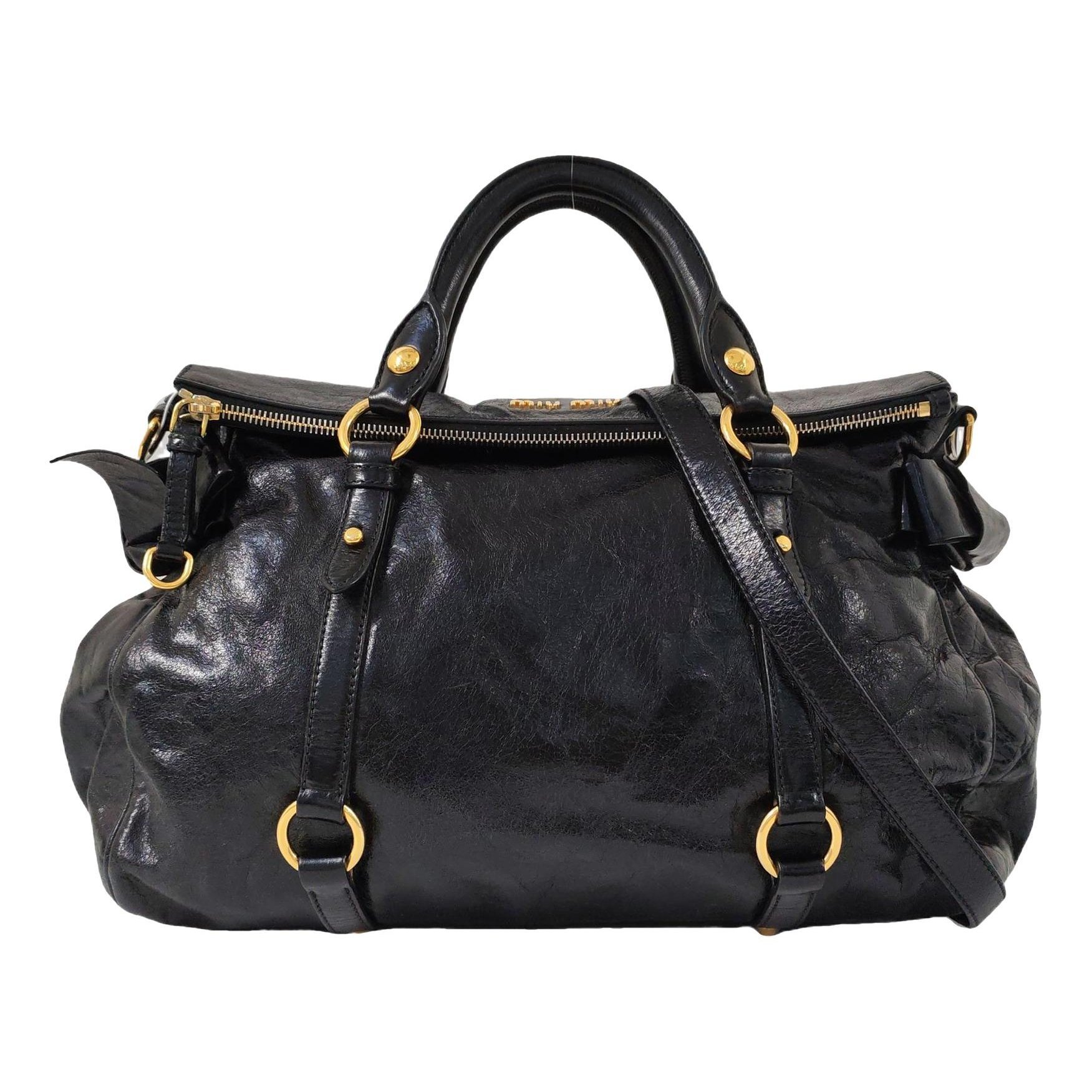 Bow bag leather handbag