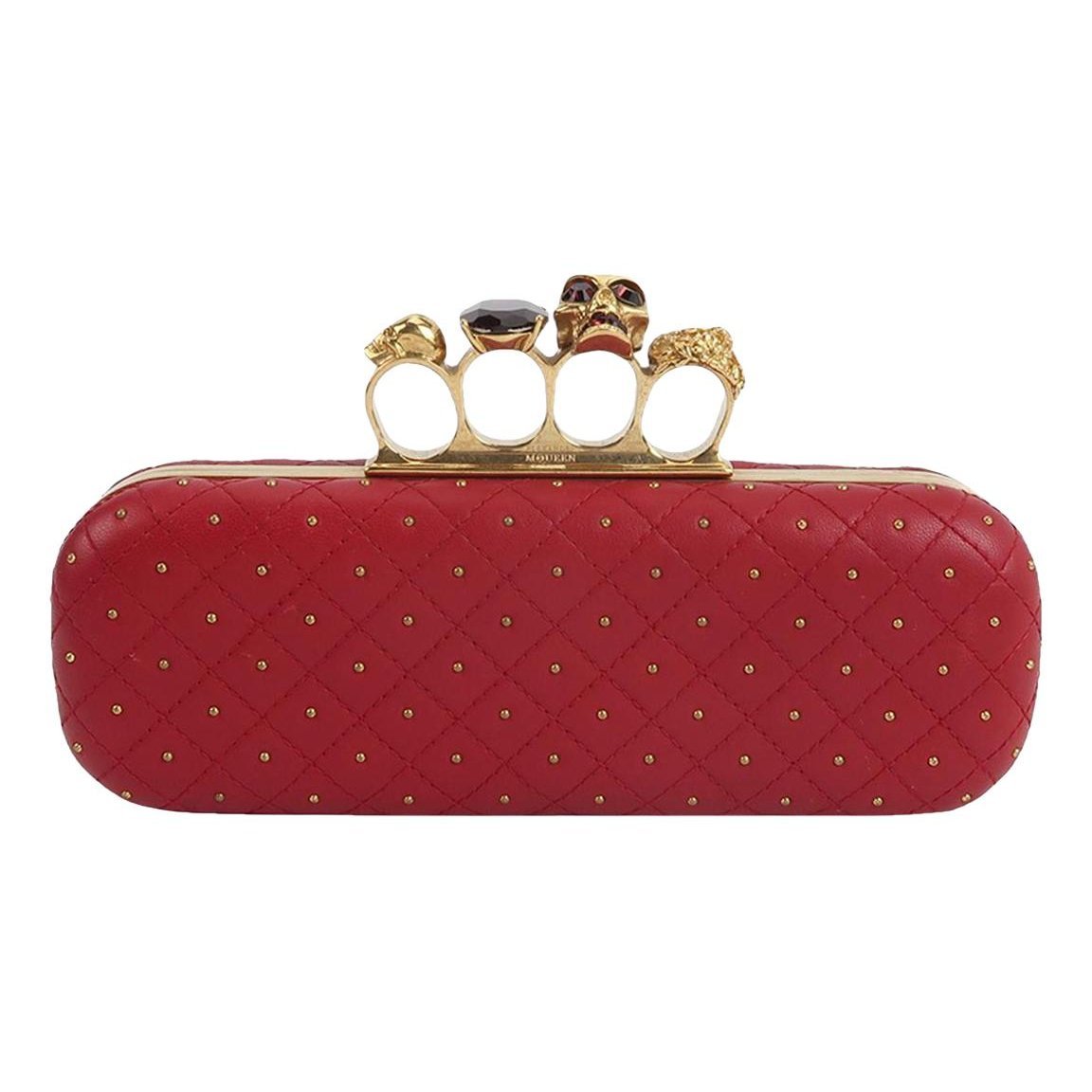 Knuckle leather clutch bag