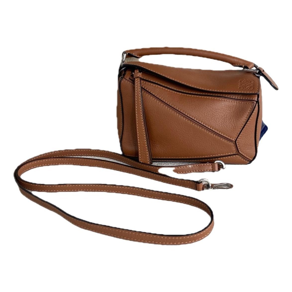 Puzzle leather handbag